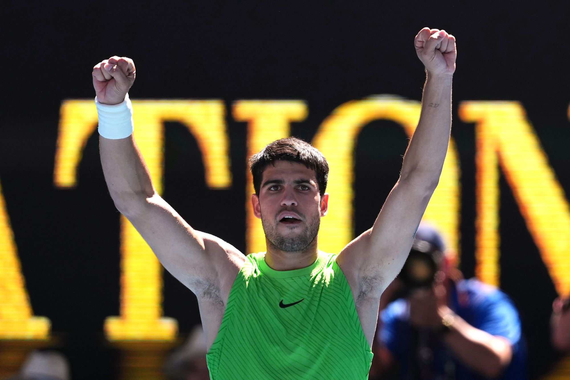 Carlos Alcaraz celebrates winning his third round match