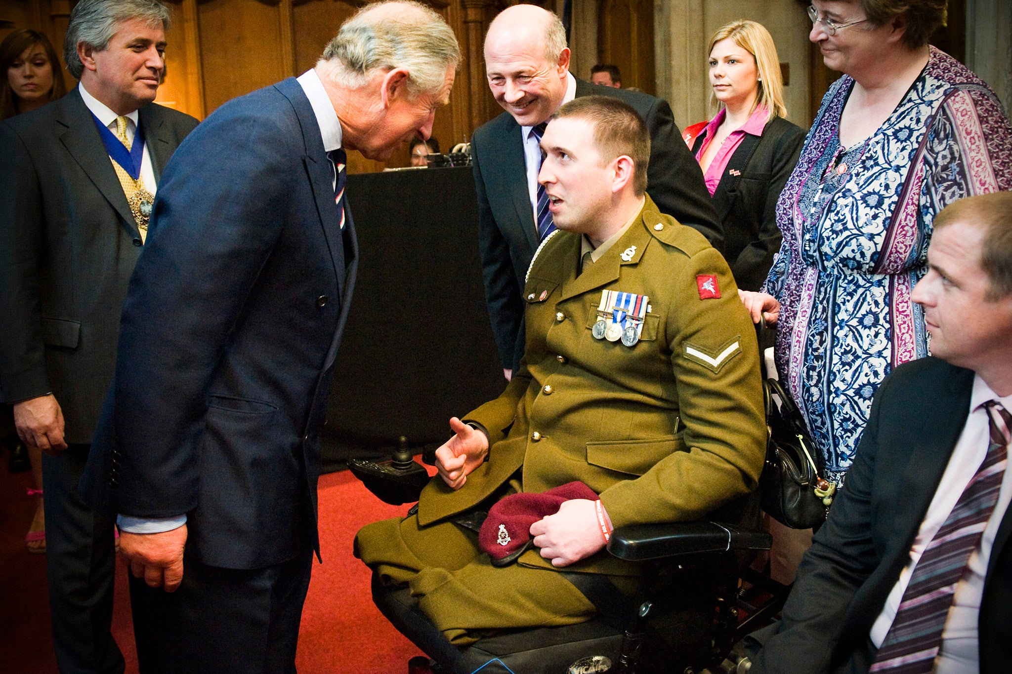 Ben Parkinson and his parents, Andrew and Diane, meeting the then-Prince Charles