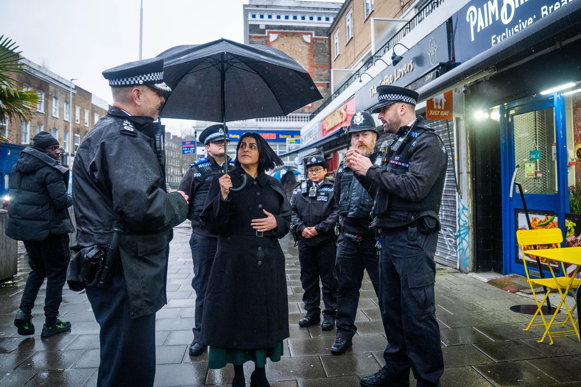 Shabana Mahmood speaks with police officers during a walkabout in Lambeth, south London ahead of a major shake-up of policing in England and Wales