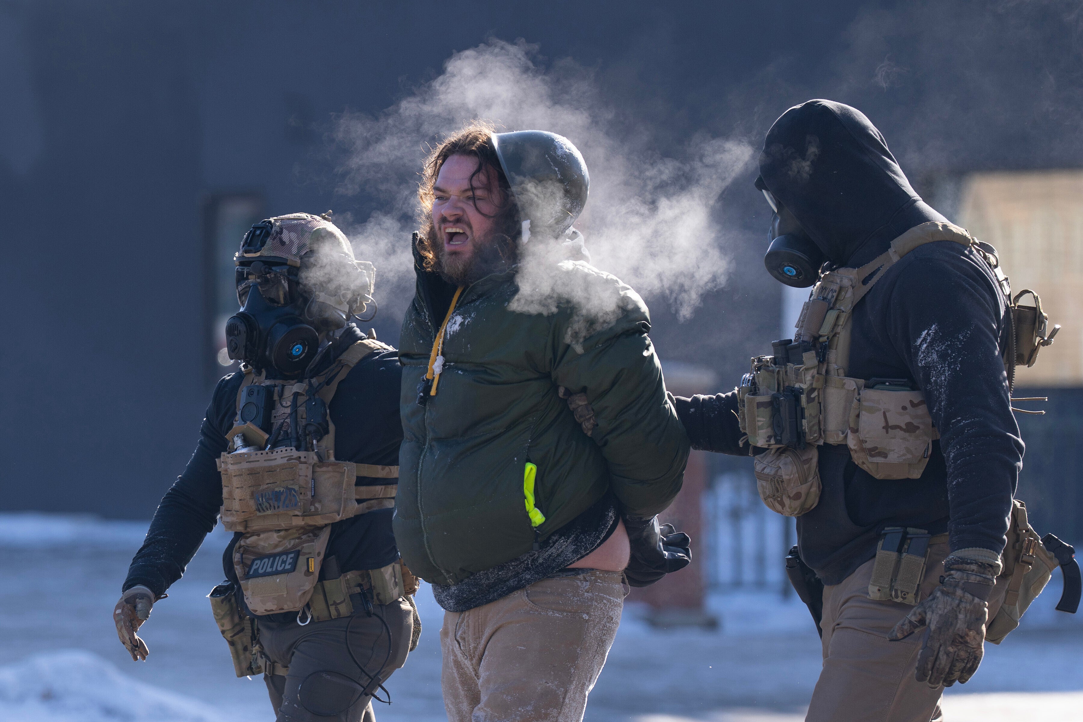 Another protester is arrested during demonstrations against the immigration crackdown in Minneapolis