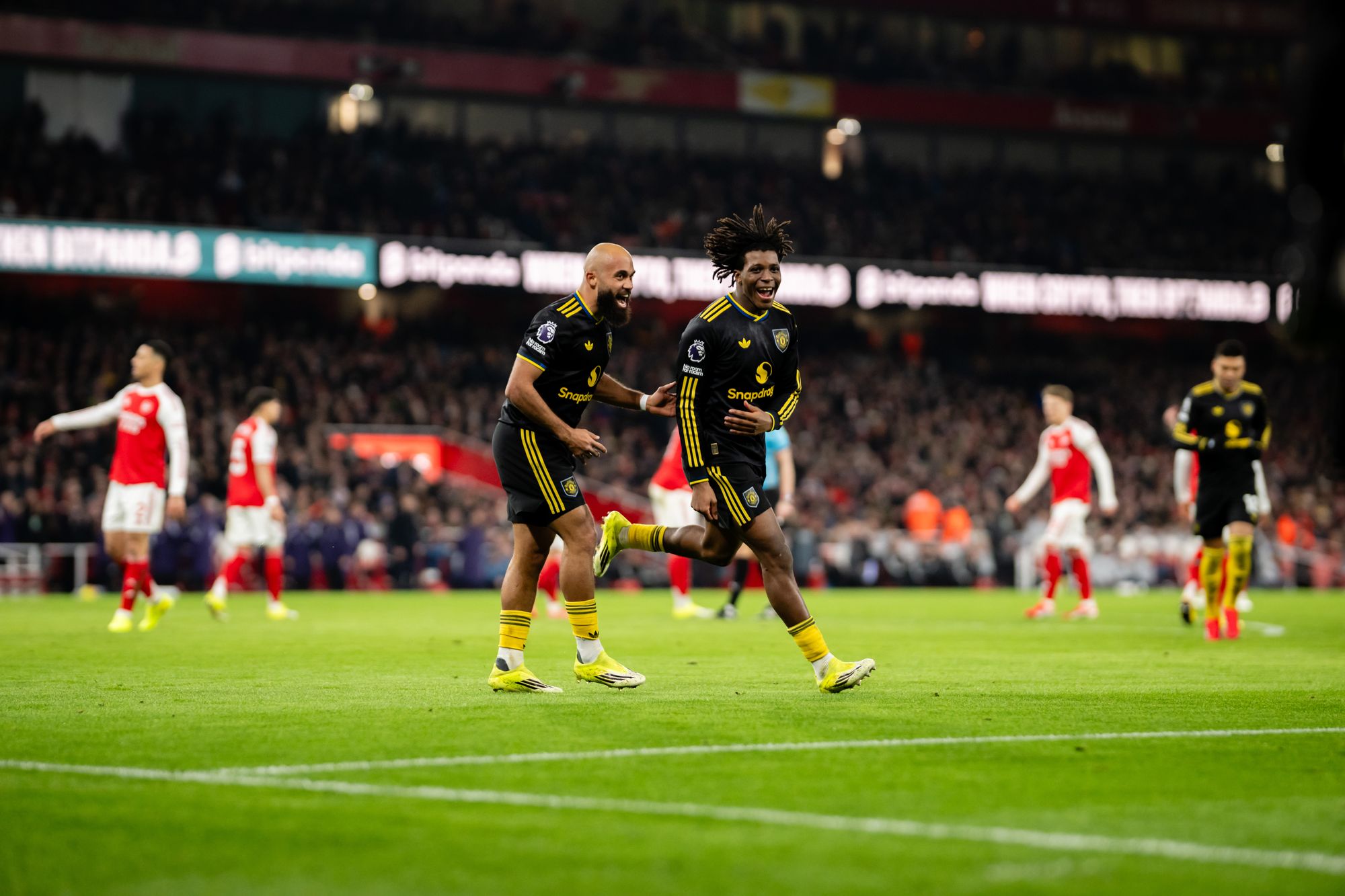 Patrick Dorgu wheels away in celebration after scoring his stunning volley