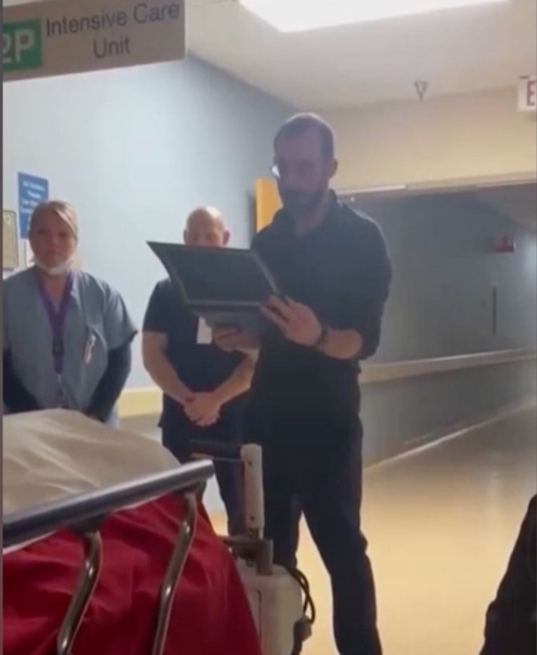 Video emerges of ICU nurse killed by federal agents honoring deceased veteran