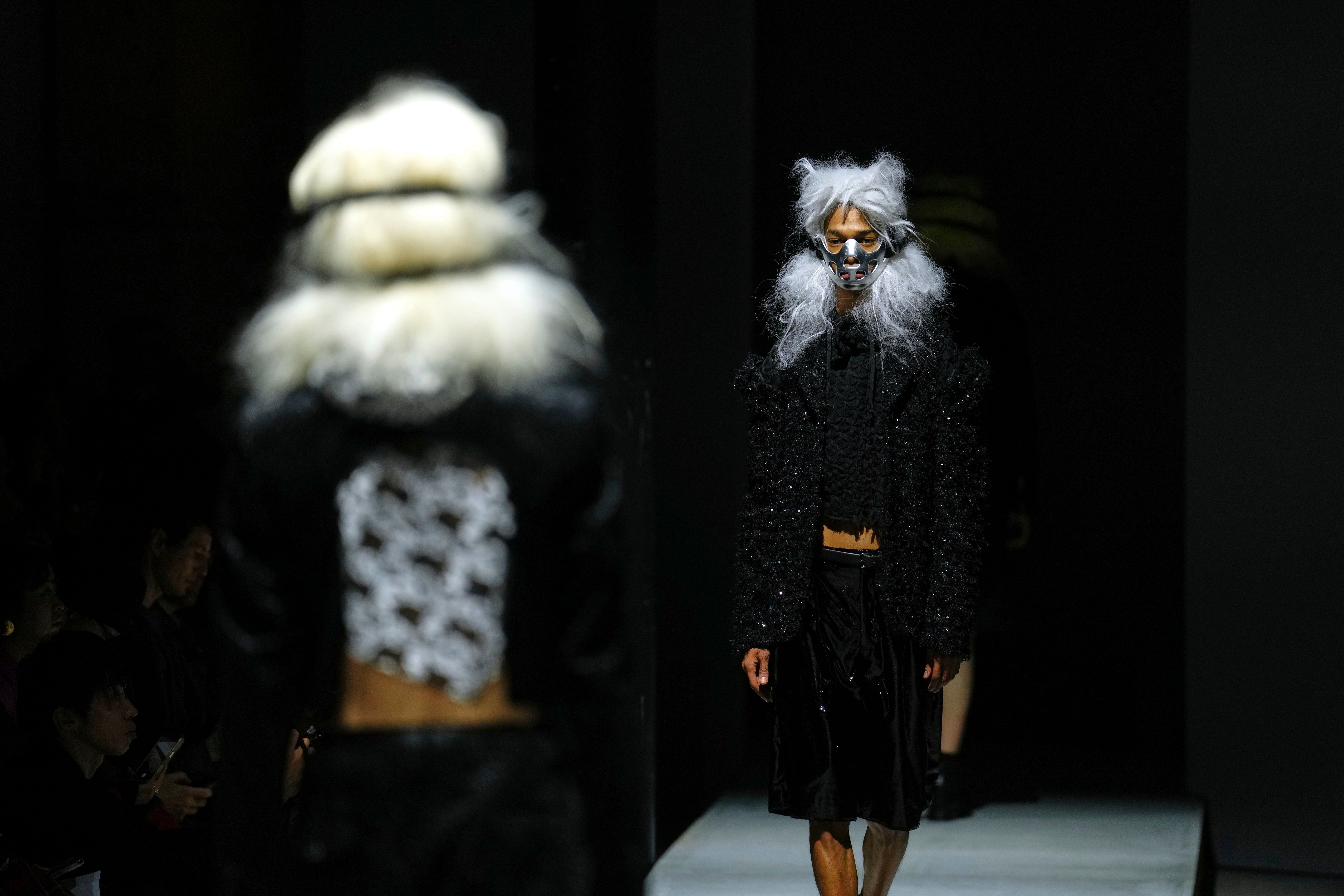 Models wear creations as part of the Comme des Garcons Fall/Winter 2026-2027 Men's collection