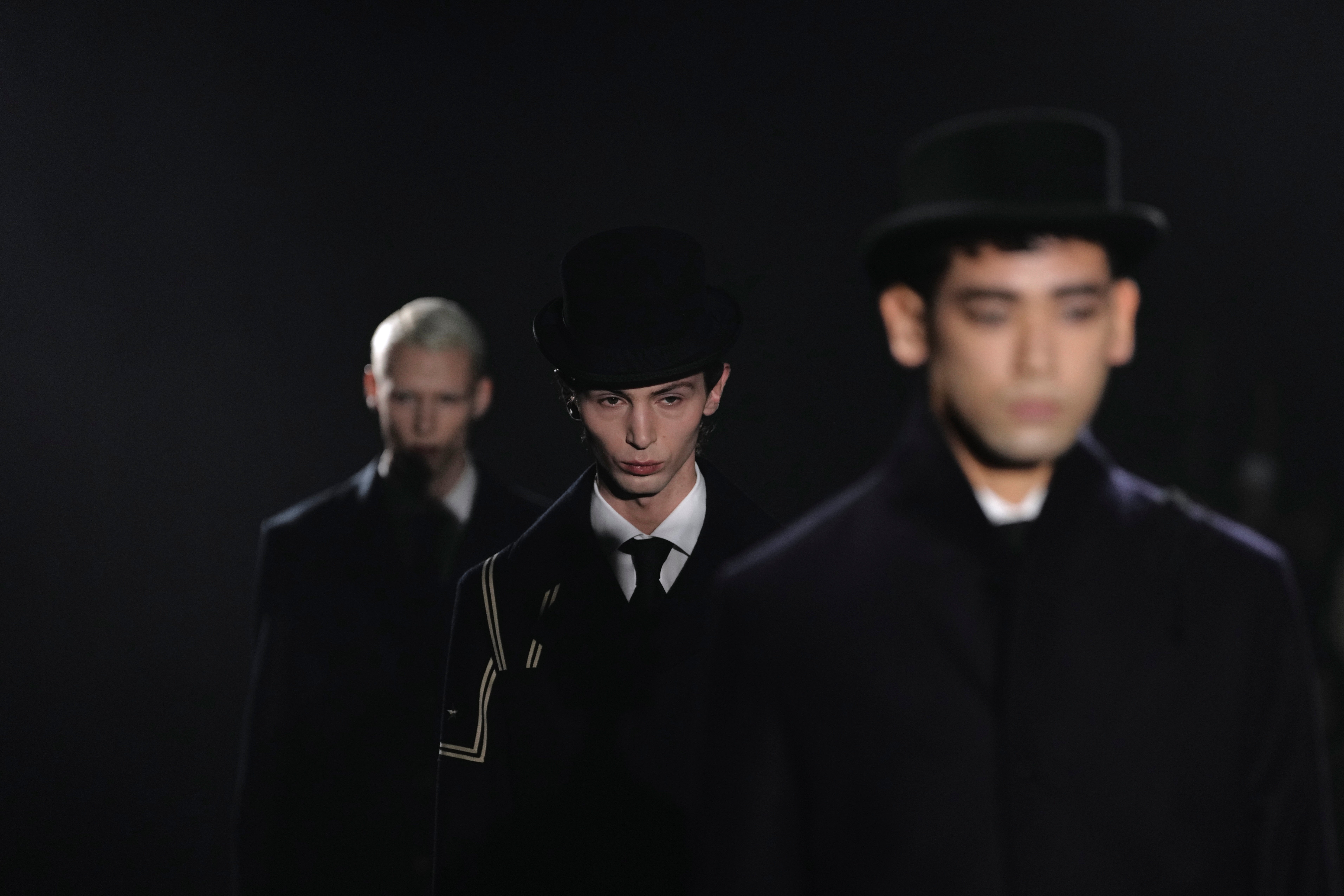 Models wear creations as part of the Junya Watanabe Fall/Winter 2026-2027 Men's collection