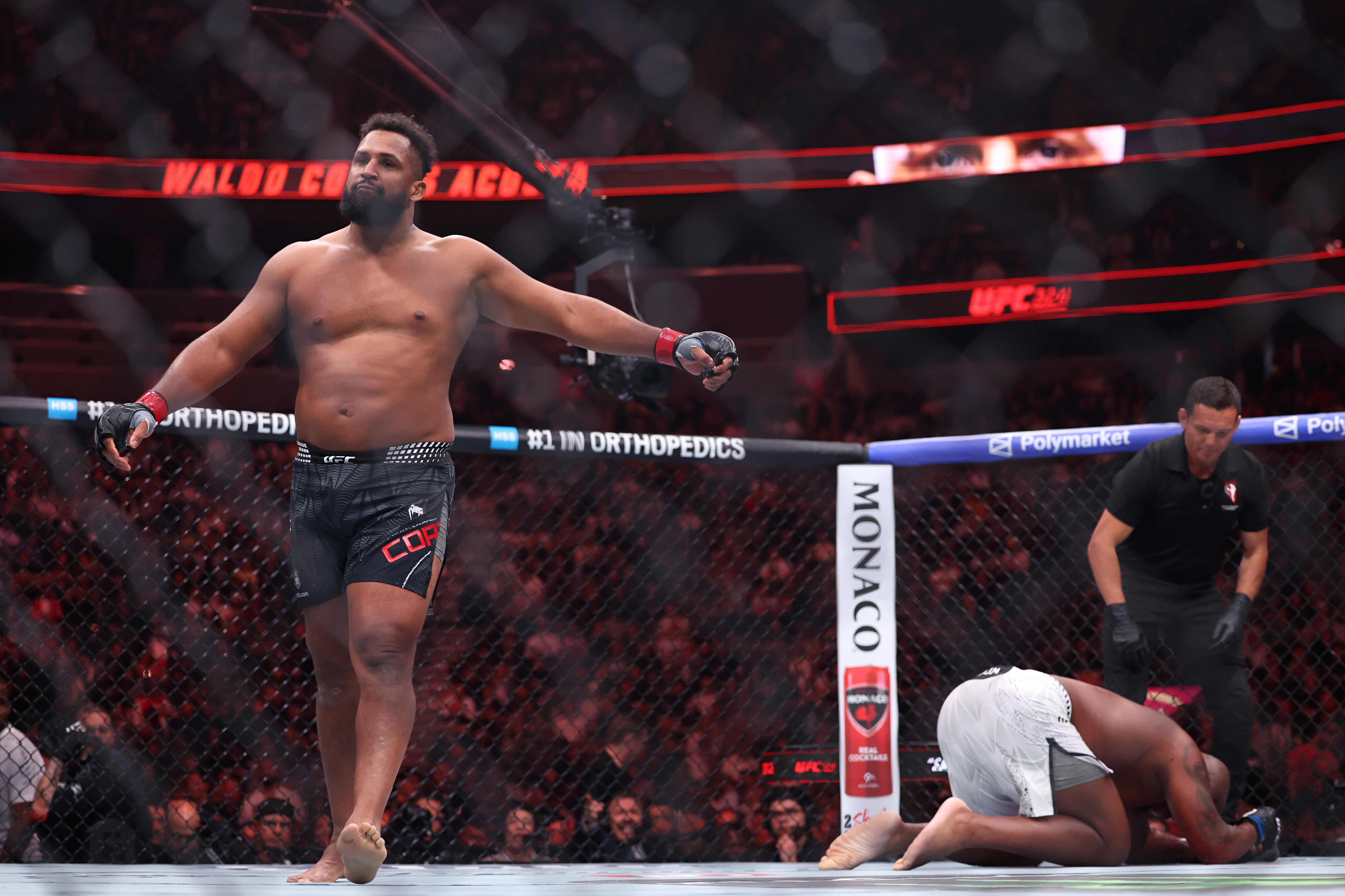 Waldo Cortes-Acosta celebrates his stoppage of Derrick Lewis