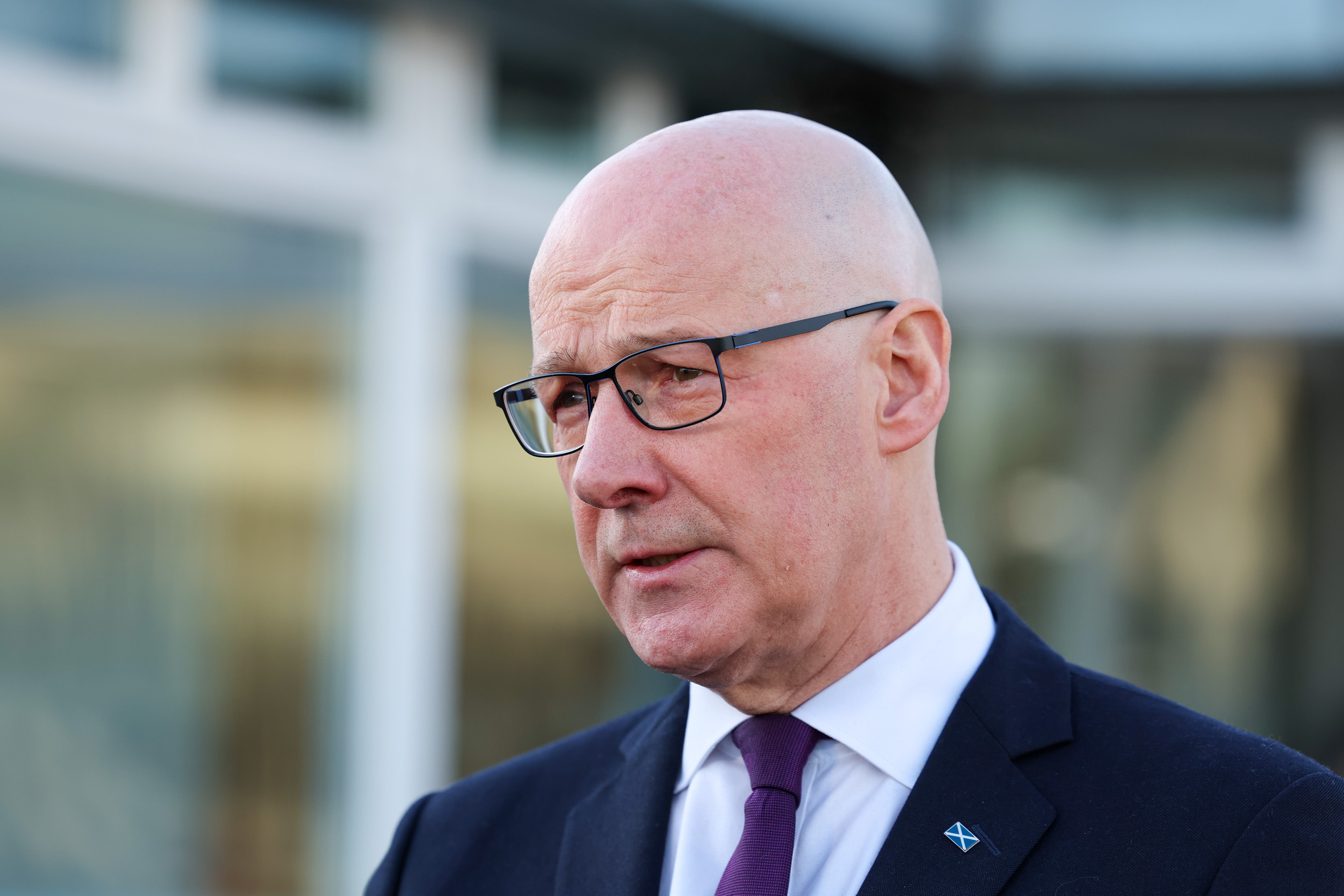 First Minister John Swinney will visit London (Robert Perry/PA)