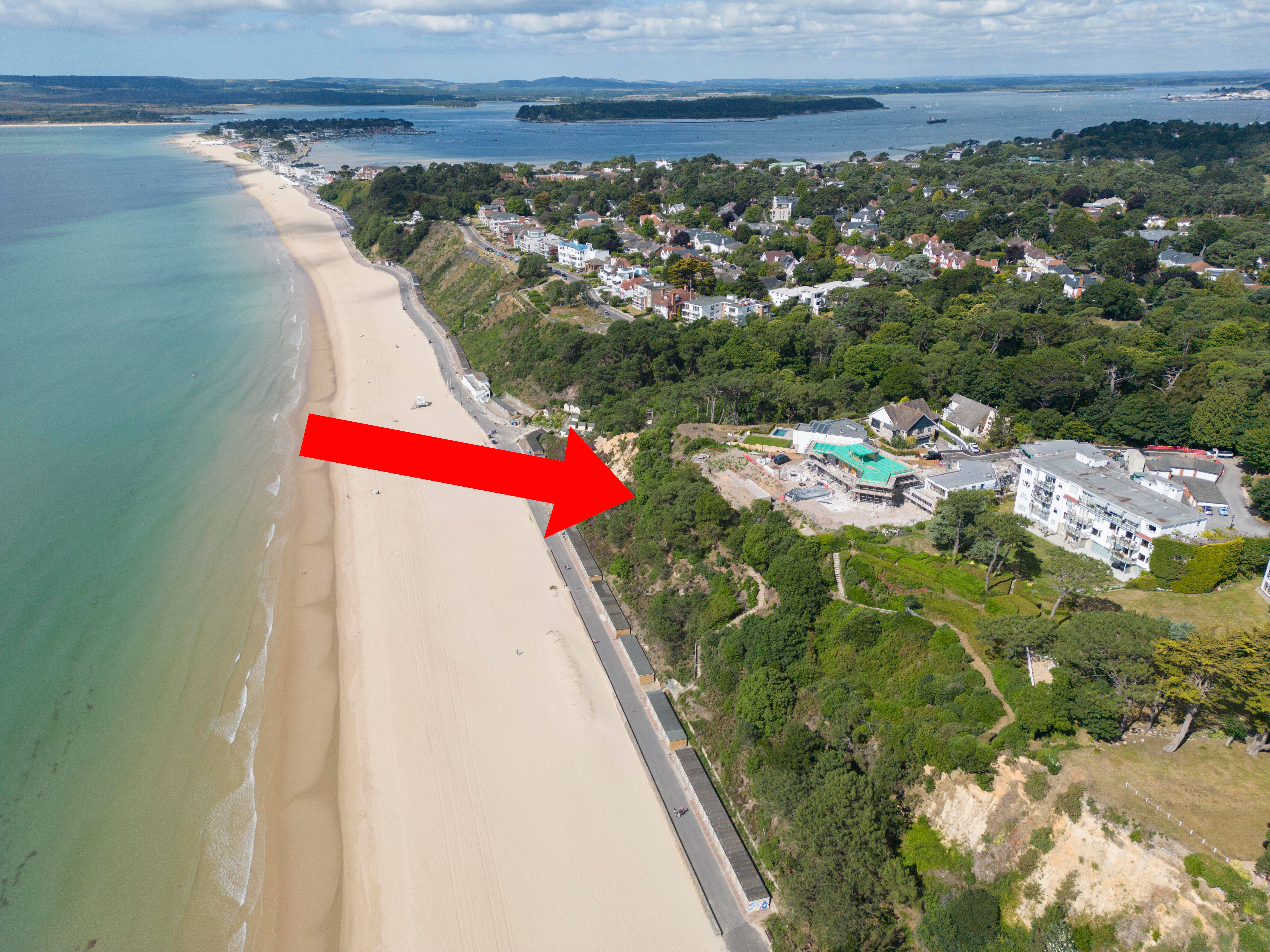 An aerial view of Bill Buckler's clifftop mansion under construction
