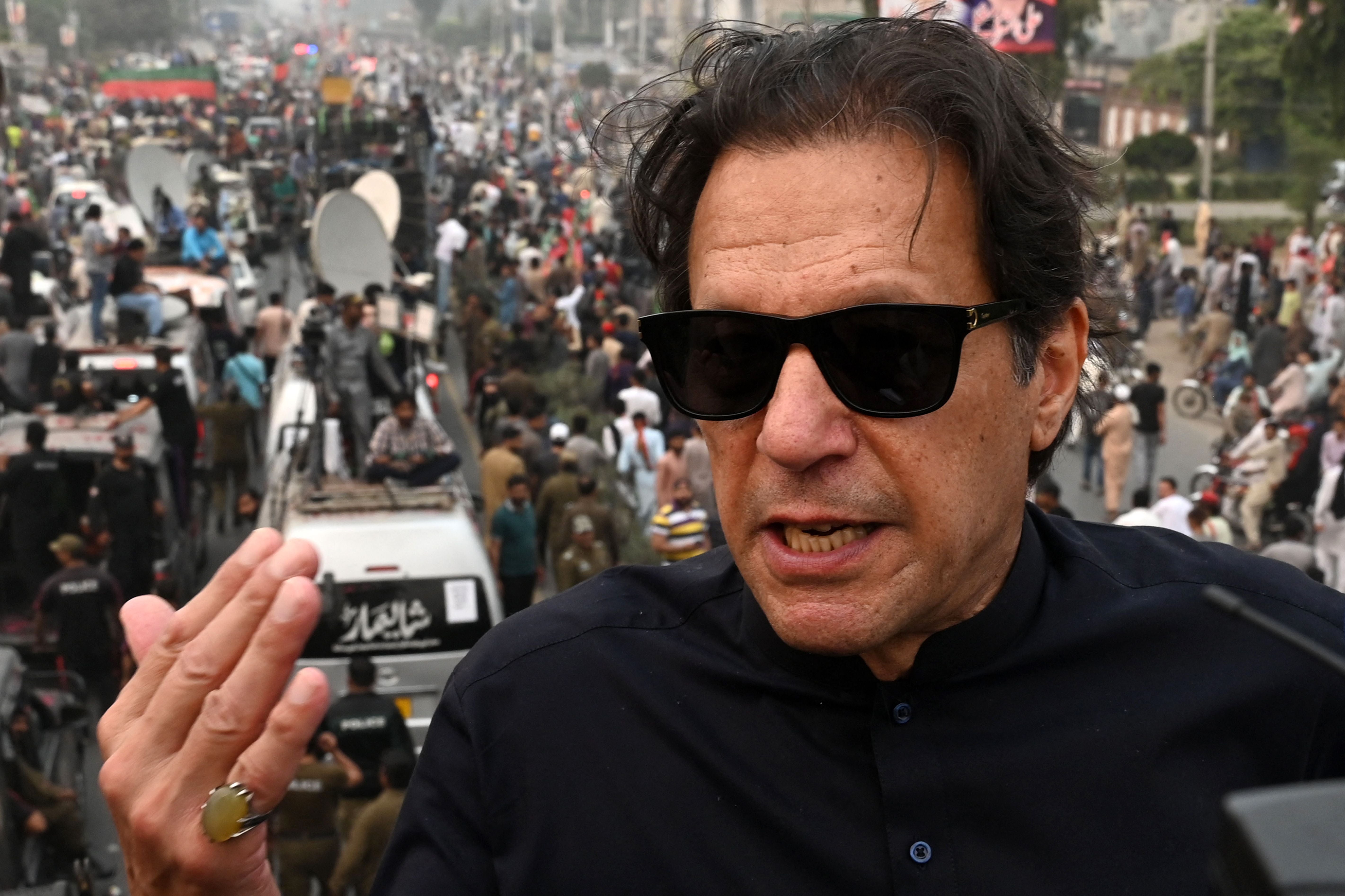 Pakistan's former prime minister Imran Khan speaks while taking part in an anti-government march in Gujranwala in November 2022