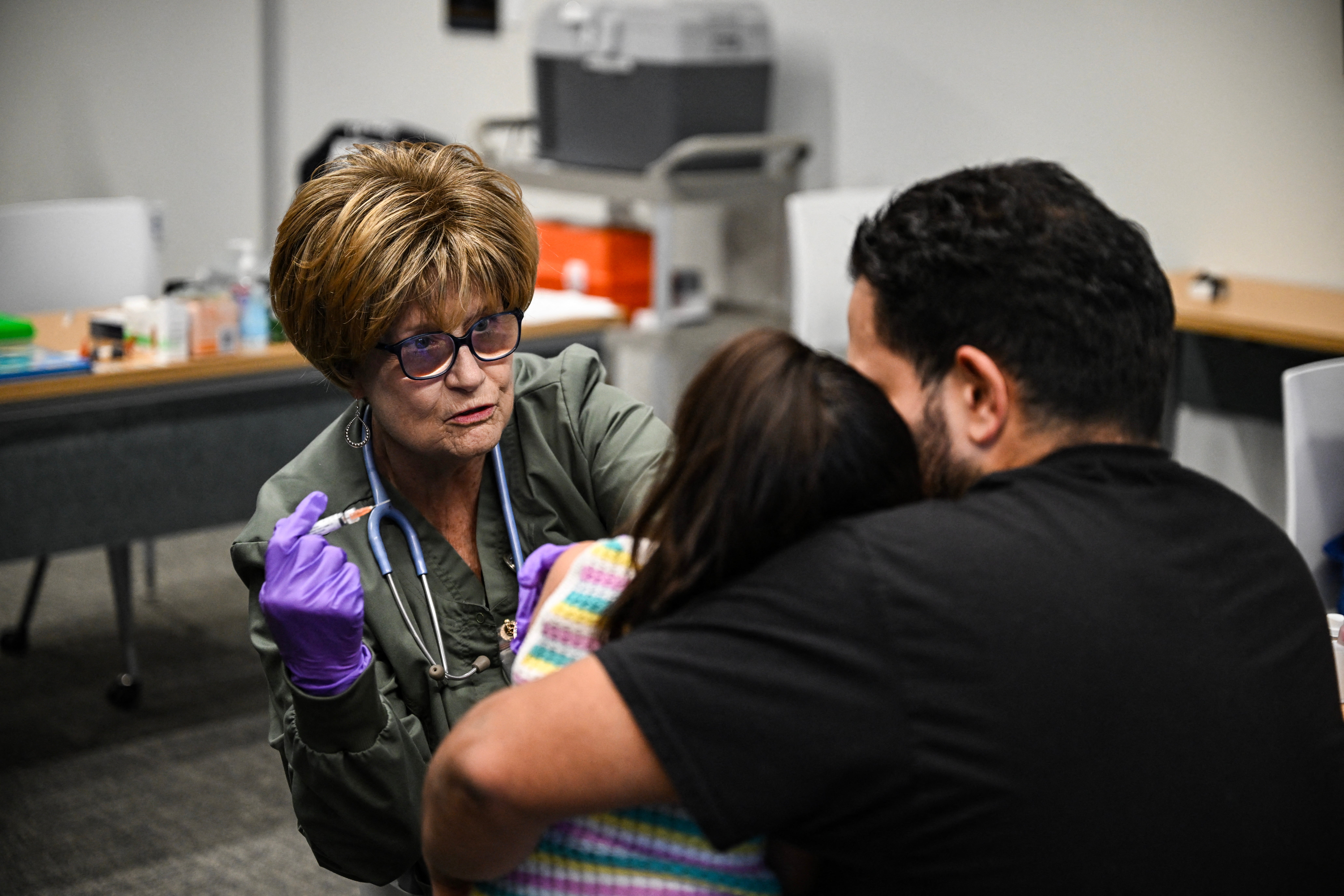 A member of a medical staff administers a dose of the measles vaccine to a child at a health center in Lubbock, Texas, in February 2025. The U.S. is seeing its worst outbreak of the vaccine-preventable virus in over three decades