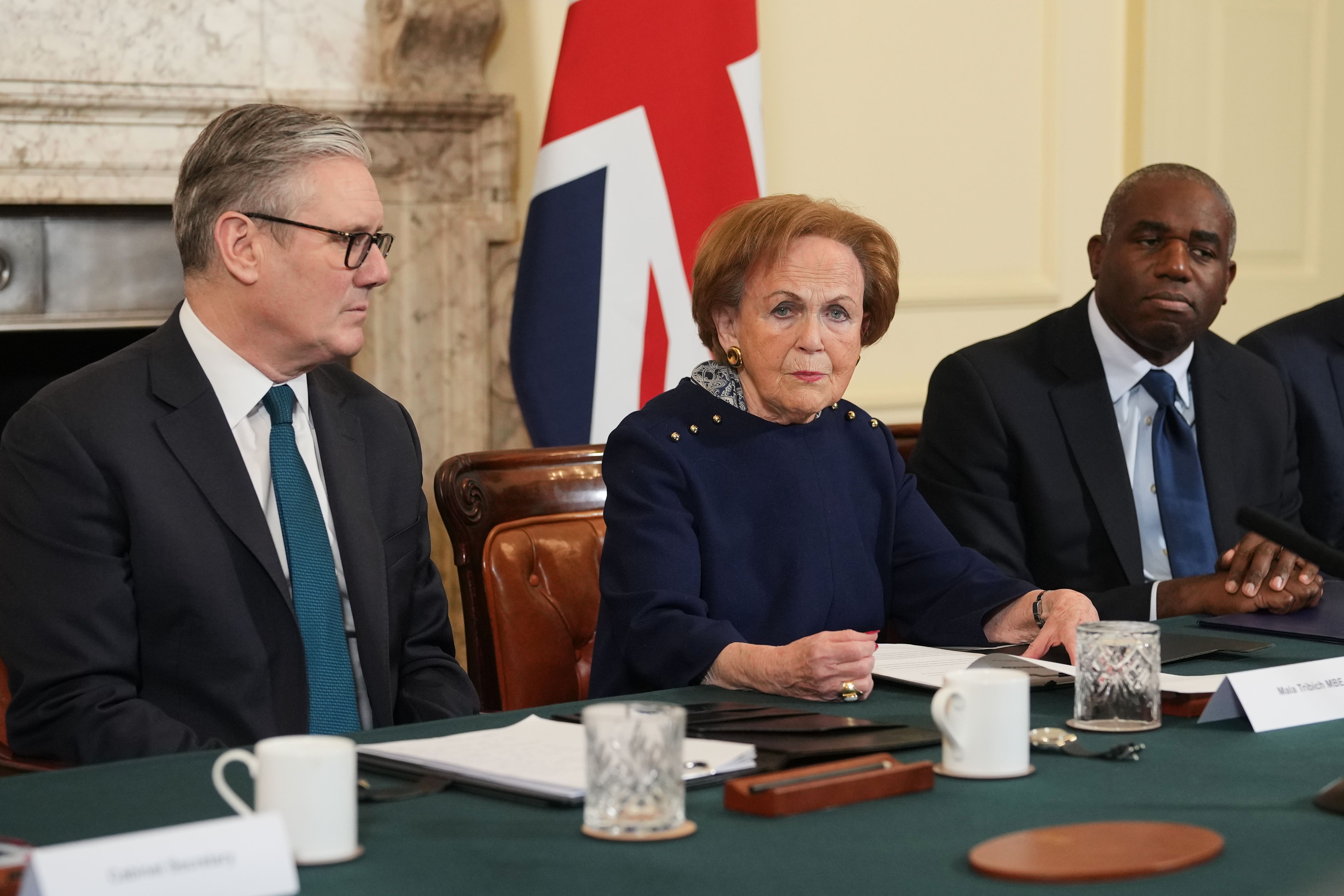 Prime Minister Sir Keir Starmer, left, told Mala Tribich, centre, he was ‘humbled’ by her courage and ‘inspired’ by her story (Alastair Grant/PA)