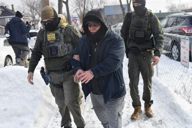 <p>US Customs and Border Protection agents arrest a man after not providing documents proving he's a citizen of the United States while patrolling a neighborhood during immigration enforcement activity in Minneapolis.</p>