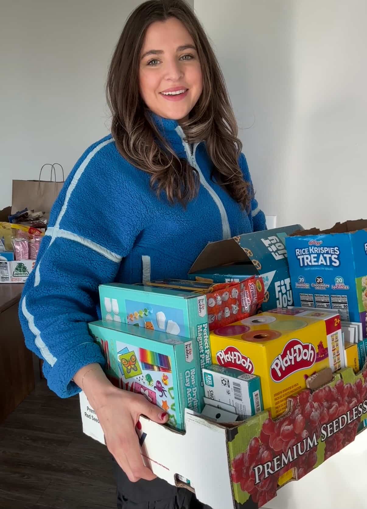 Minnesota native Maddie Flom, 28, organized an event this week at a local restaurant where people will create activity kits for children who are too afraid to go to school amid the ICE activity