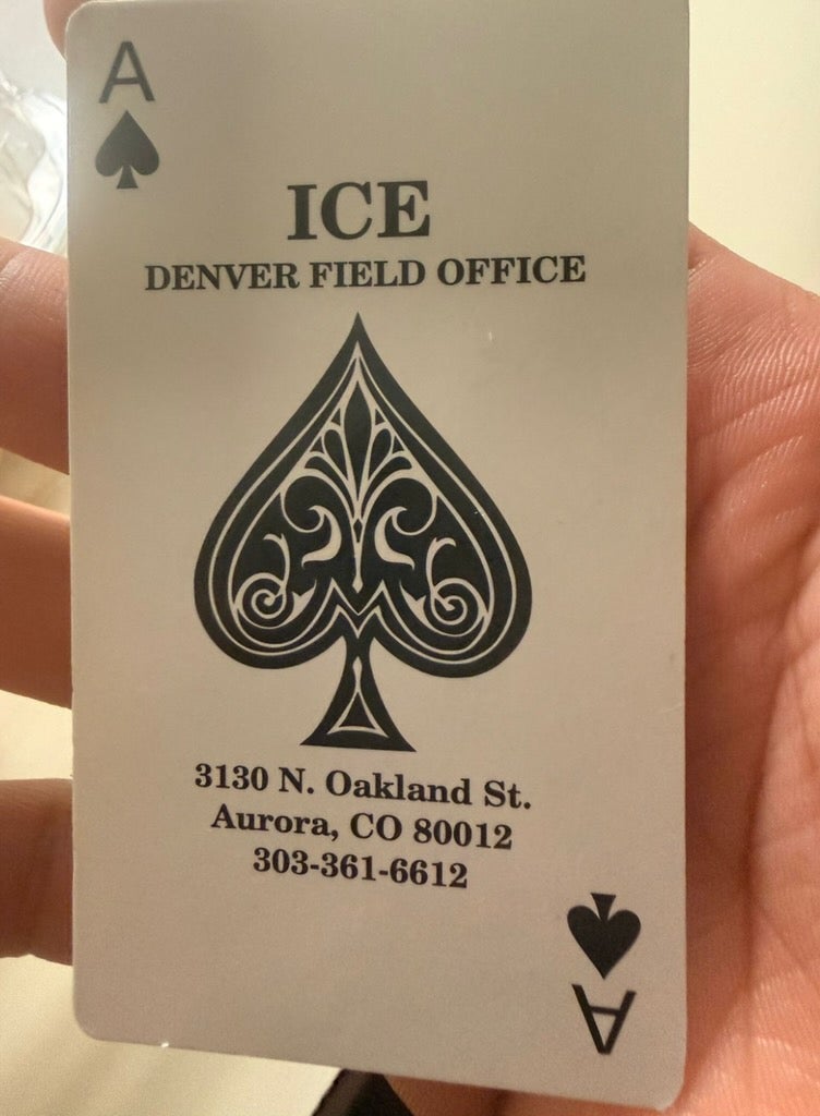 An immigrant rights advocacy group said it found ace of spades playing cards listing the address and phone number of the ICE Denver field office