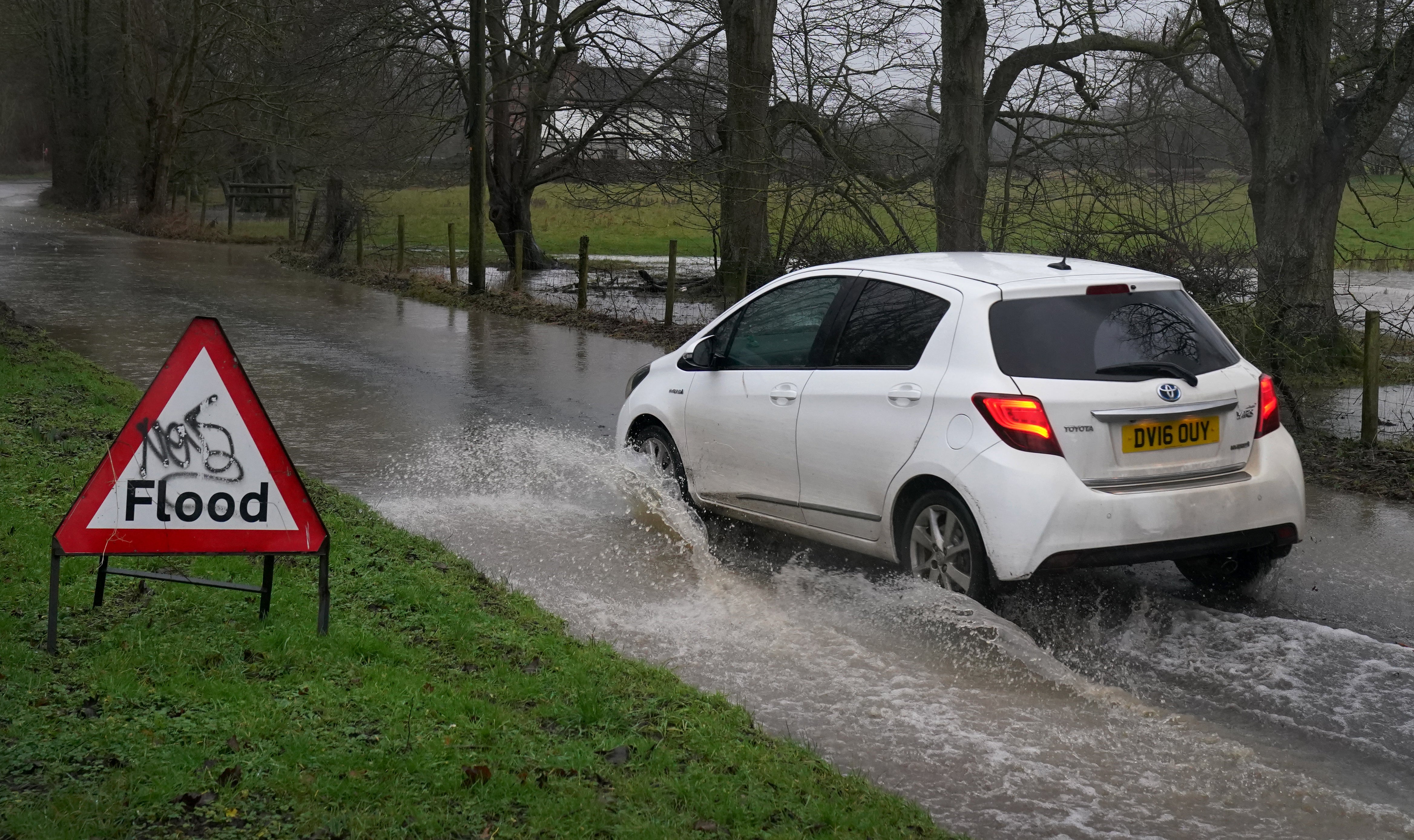 Britons hit by record January rainfall as Storm Chandra causes travel chaos and flooding