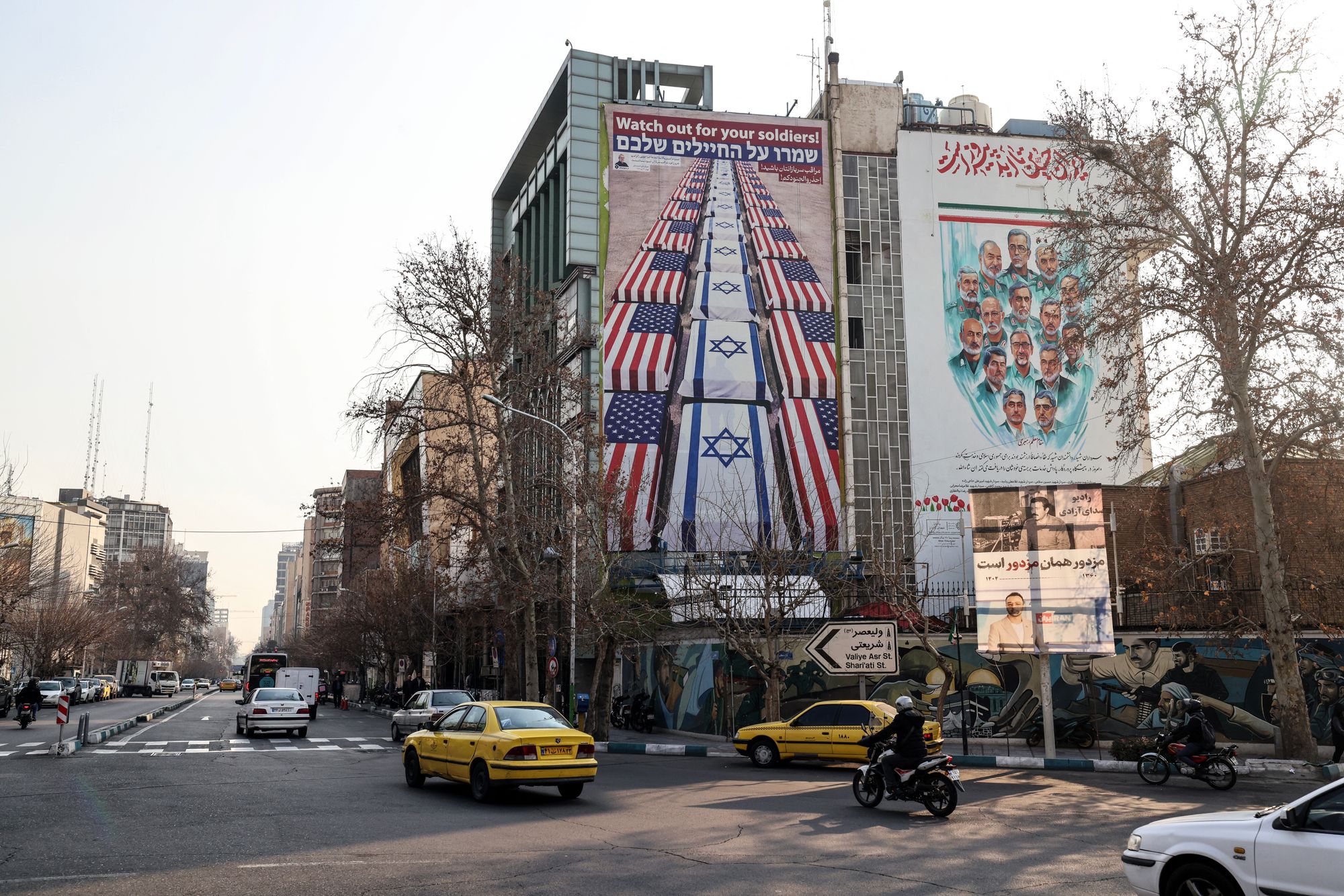 Menacing murals have gone up around Tehran warning against US military action