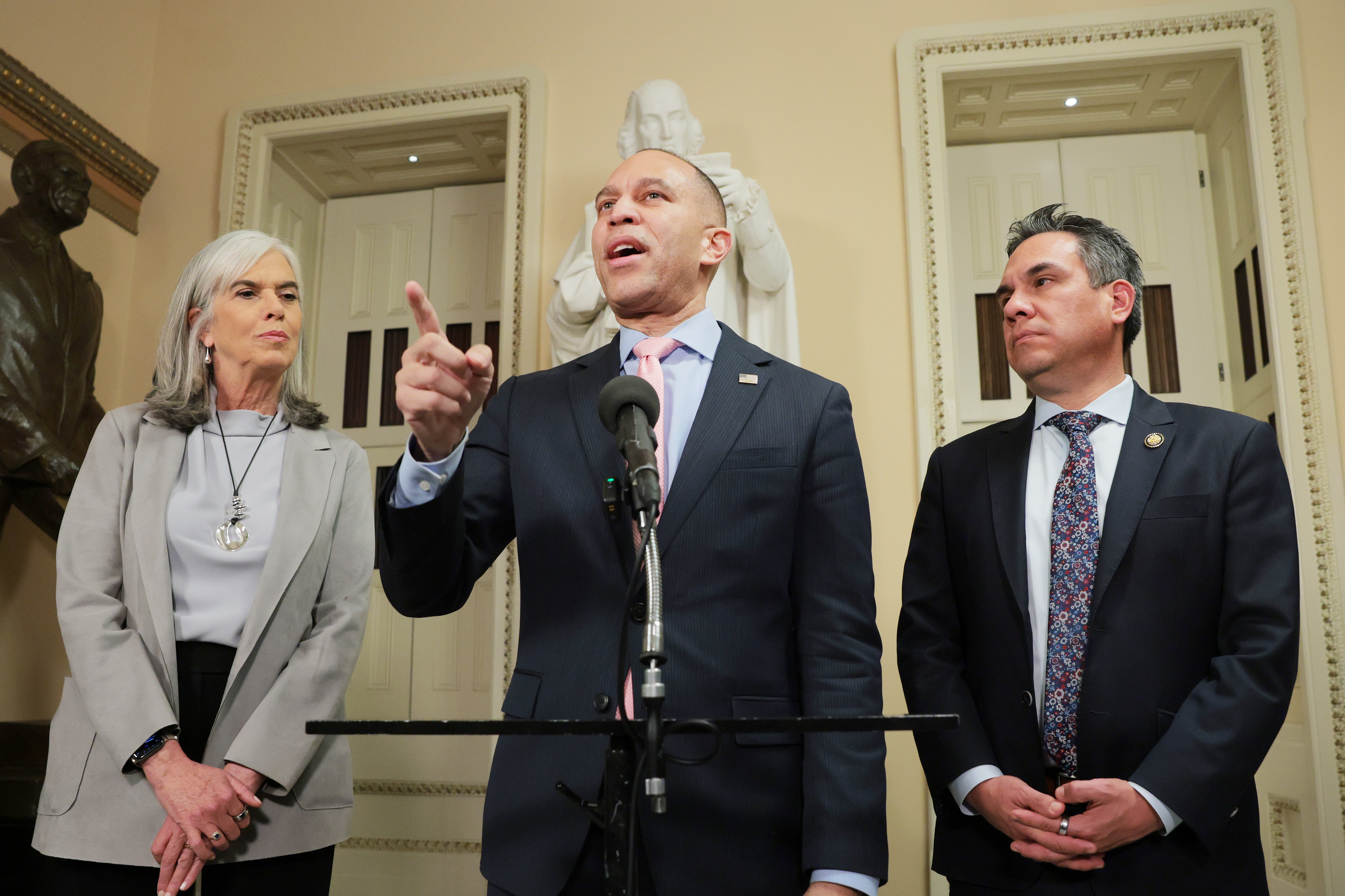 Hakeem Jeffries (center) and top Democrats Katherine Clark (left) and Pete Aguilar (right) are joining calls for Kristi Noem to step down or face impeachment investigations