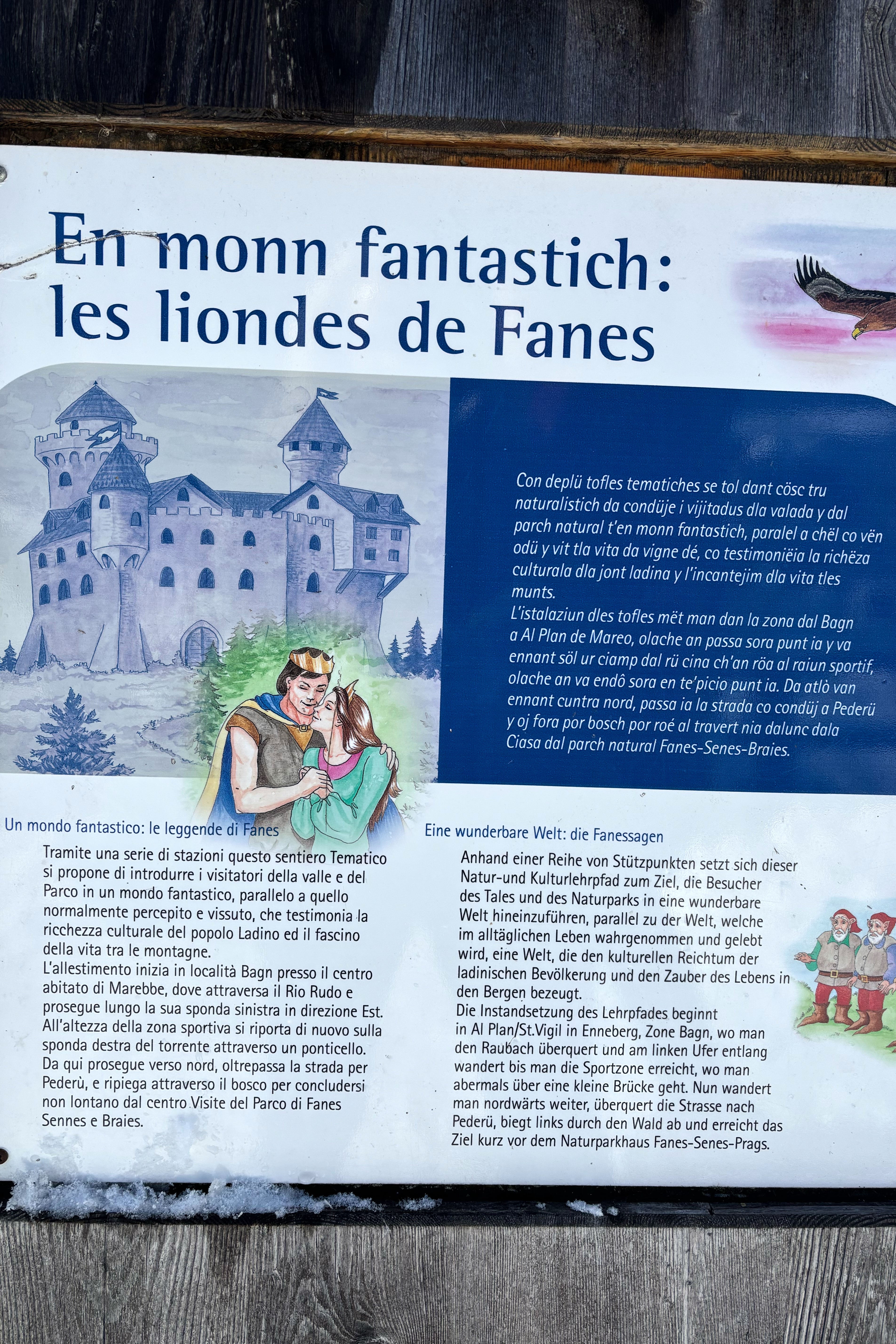 A tourist signboard written in Ladin language, Italian and German is seen in San Vigilio di Marebbe