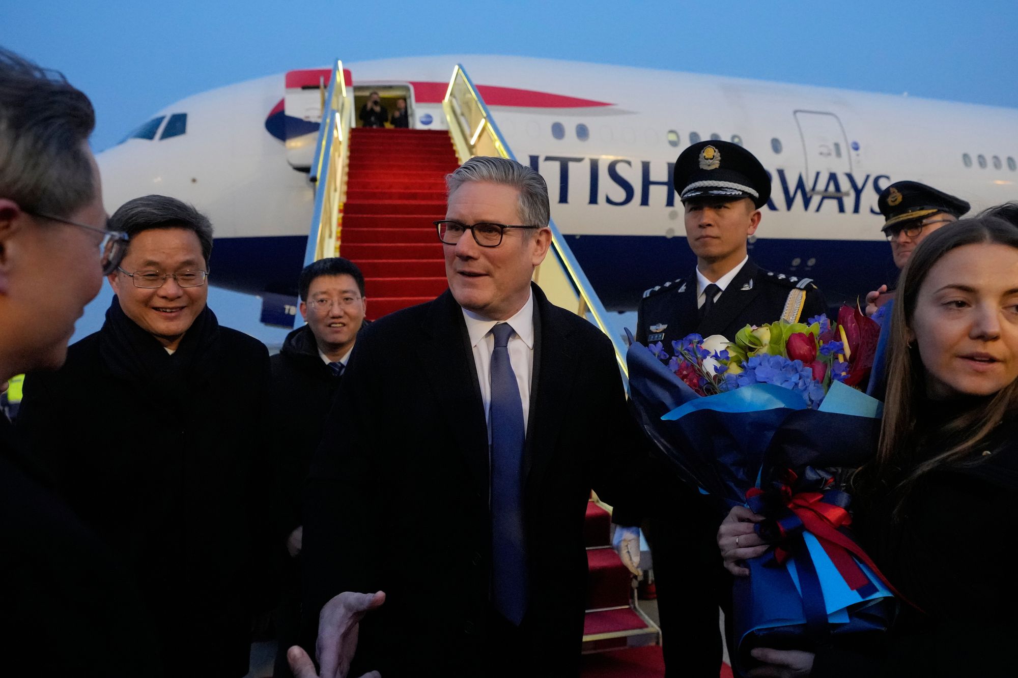 Starmer arrives in China but has left behind plotting MPs at home