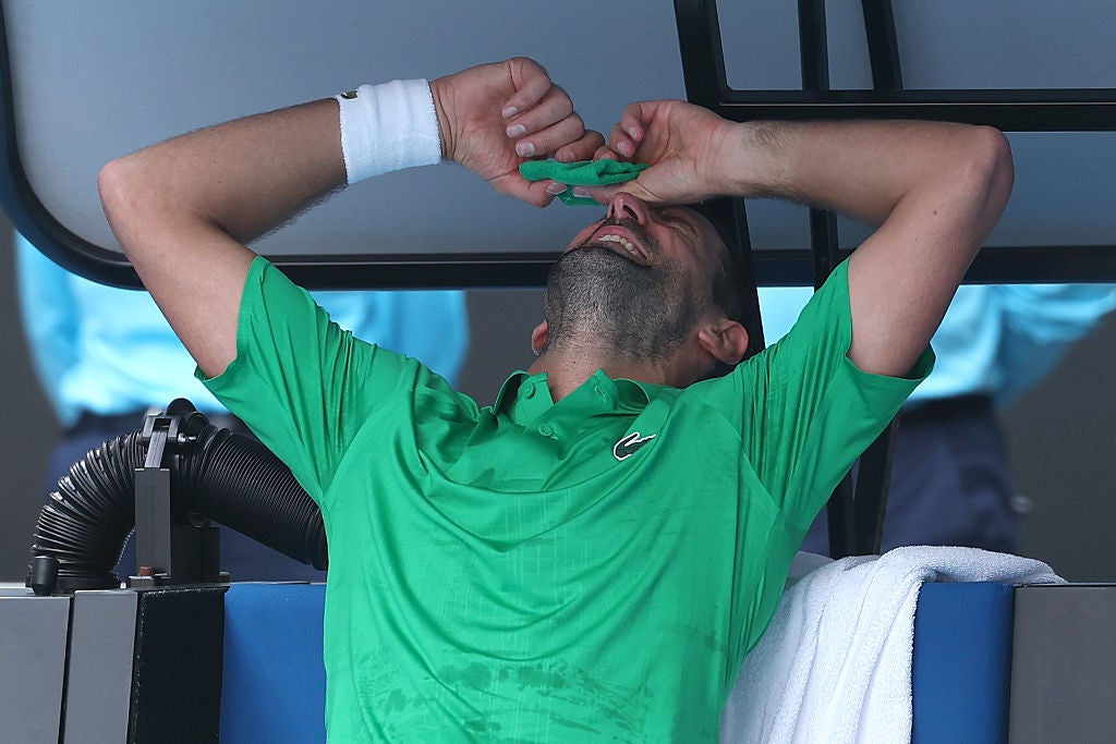 Novak Djokovic receives medial treatment against Lorenzo Musetti