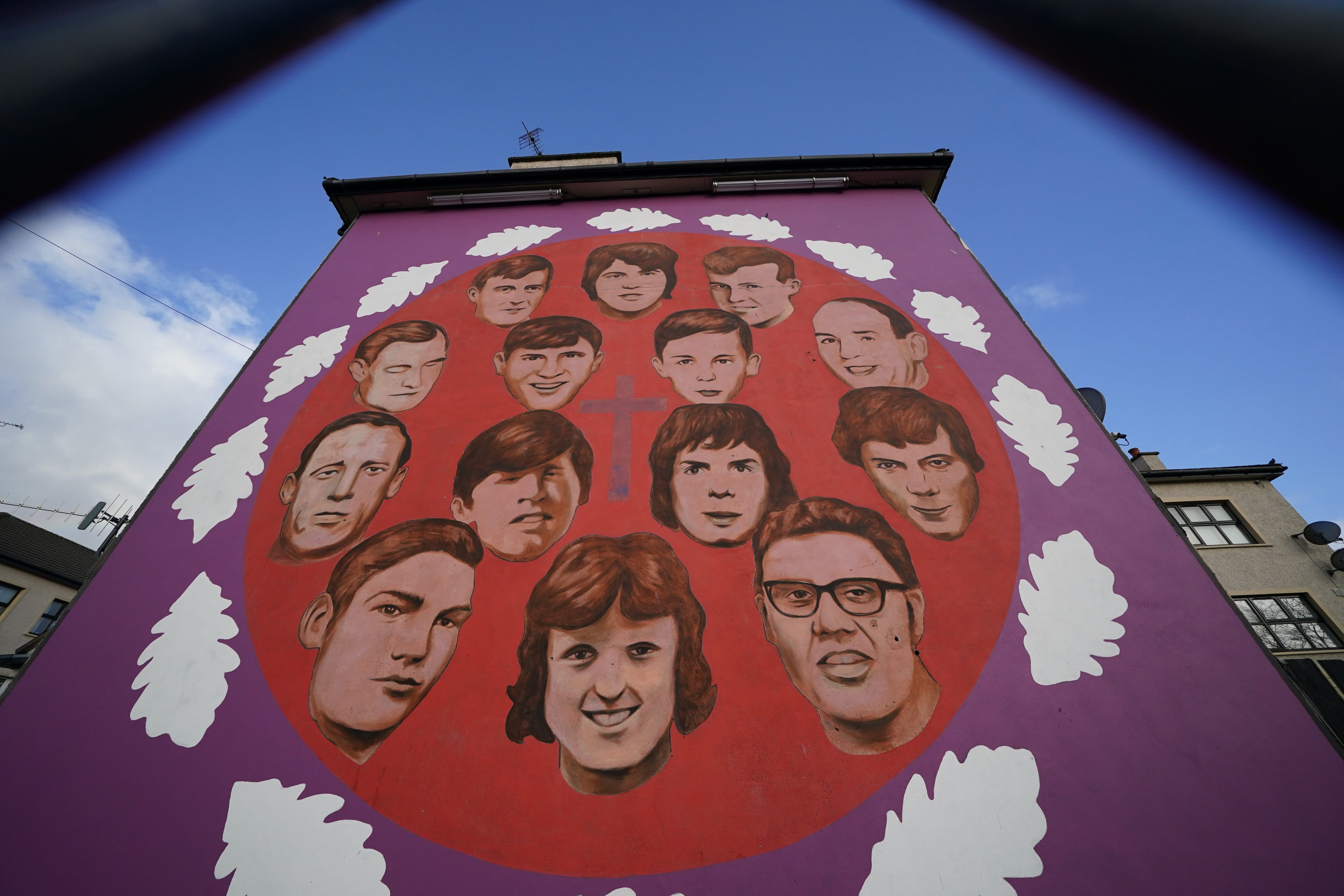 A mural on the side of a house remembering those who died on Bloody Sunday (PA)