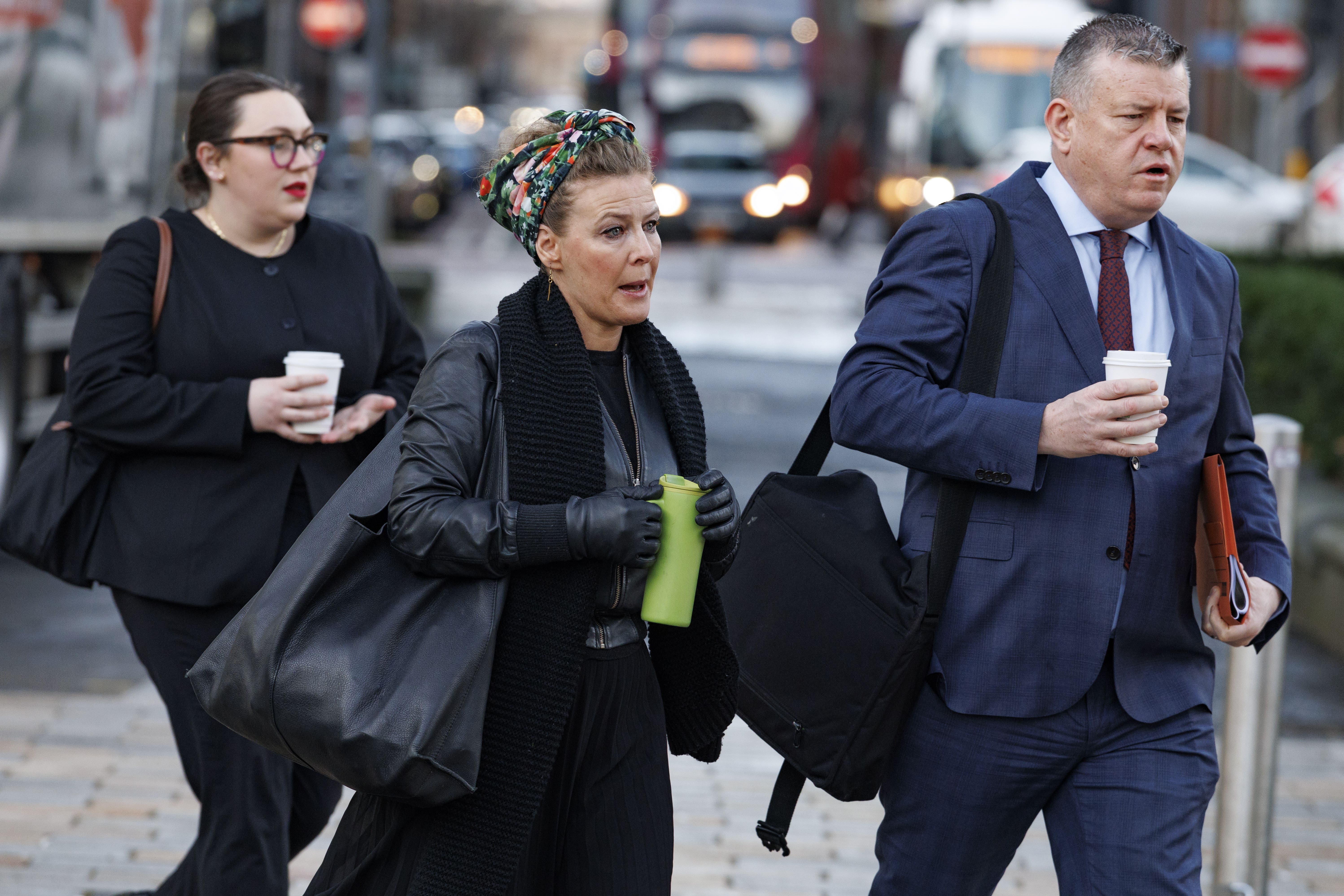 Fiona Donohoe (centre), the mother of 14-year-old Noah Donohoe arrives at court on Wednesday (Liam McBurney/PA)