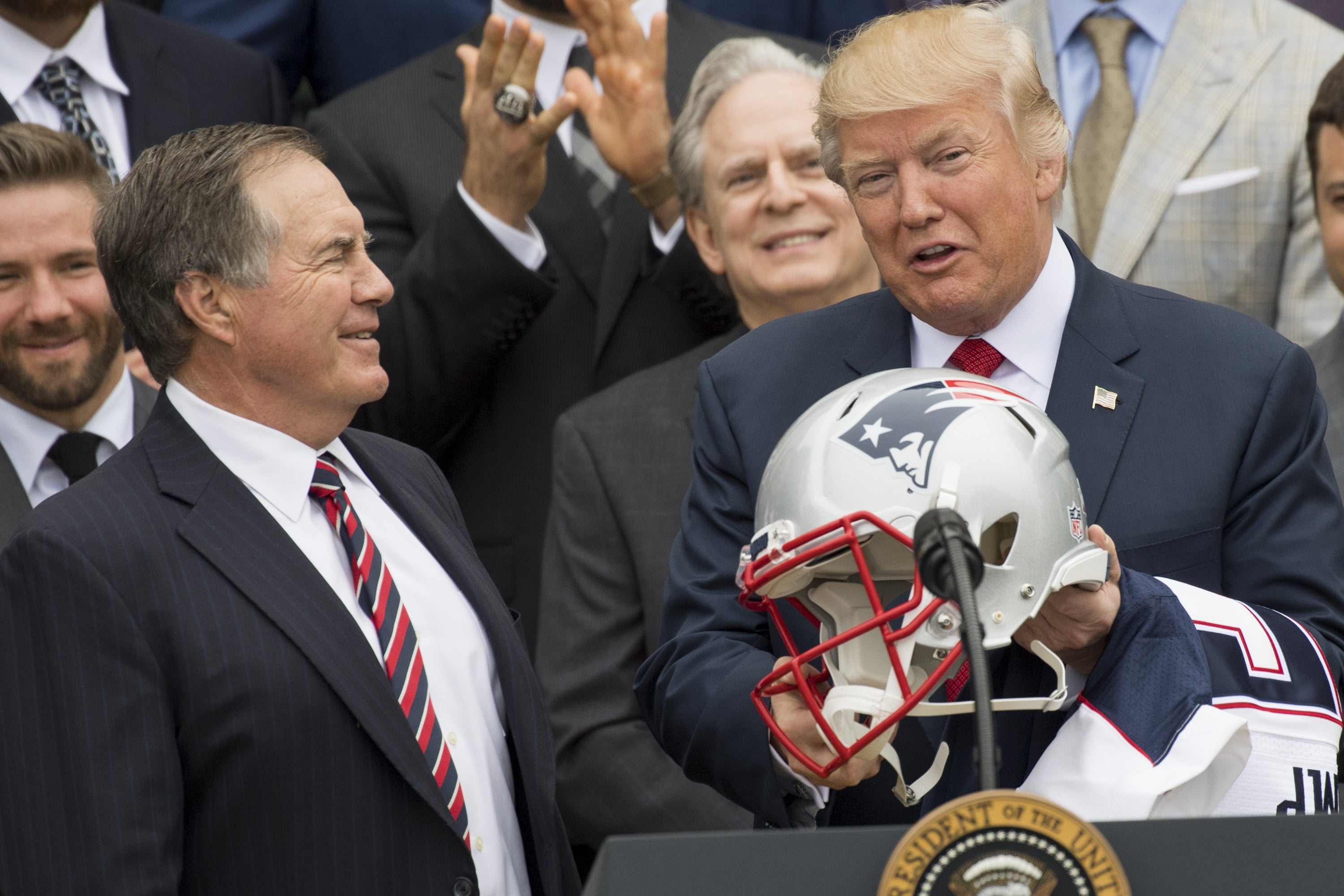 Donald Trump (right) and former New England Patriots coach Bill Belichick in 2017