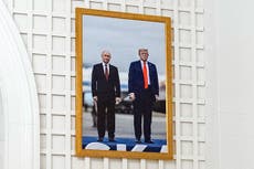 Trump hangs picture of himself and Putin in White House - above photo of his granddaughter