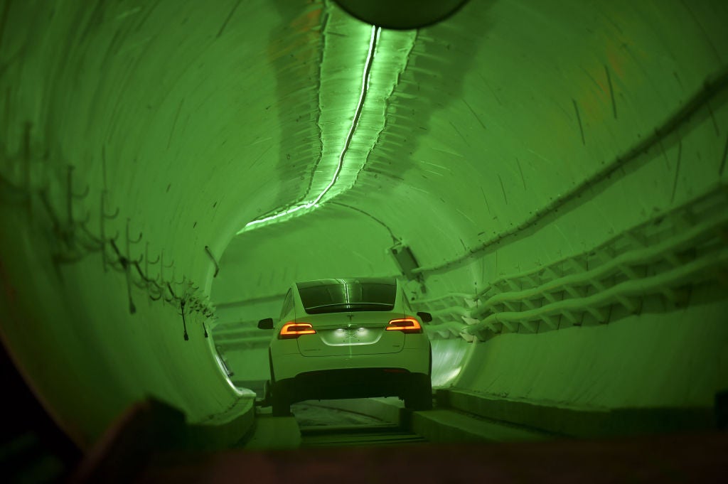 A Tesla Model X drives into the tunnel entrance in Hawthorne, south of Los Angeles on 18 December, 2018
