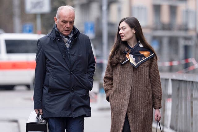 <p>Sanija Ameti, right, arrives at court with her lawyer</p>