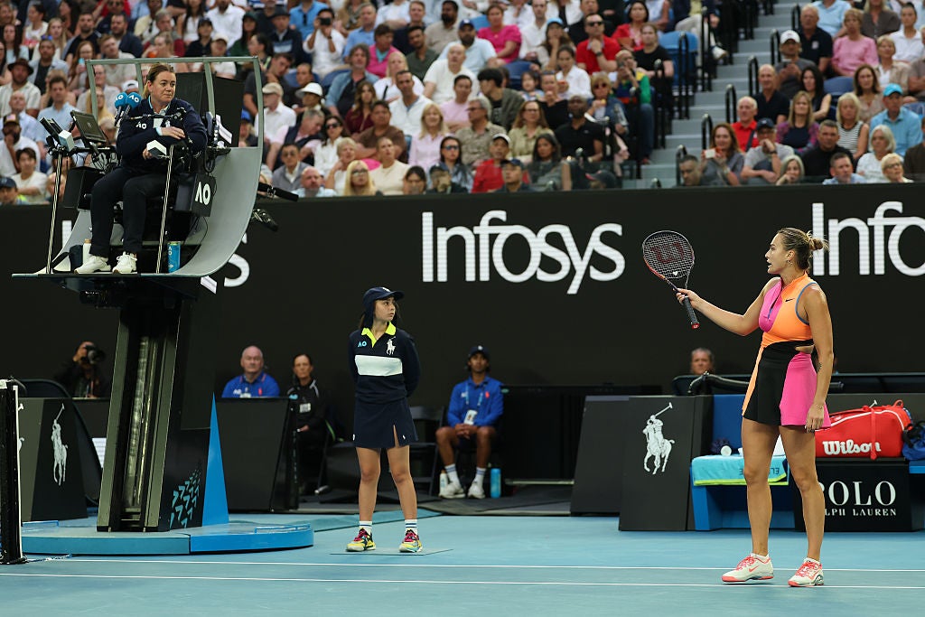 Aryna Sabalenka asks the chair umpire for a video review