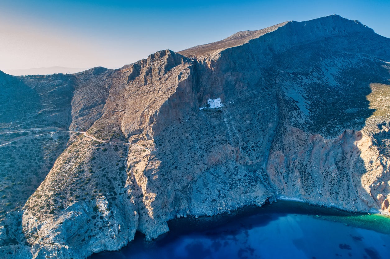 The Panagia Hozovitissa monastery, pictured, on Amorgos is perched 1,000 feet up on the side of a cliff