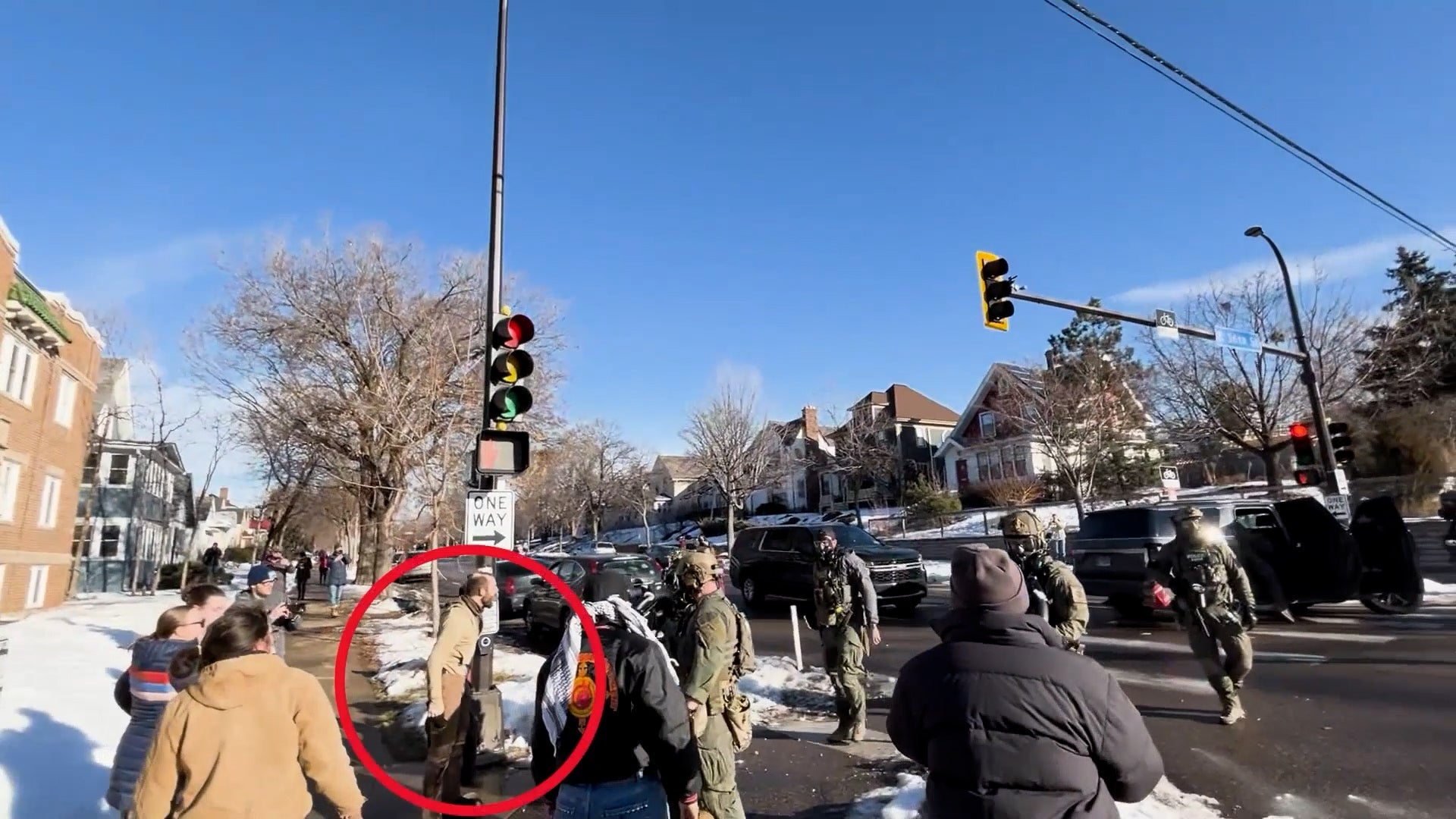 Pretti, circled, is seen in the footage without his coat on after being tackled to the ground. Witnesses told The Independent that the agents were being ‘very, very aggressive’