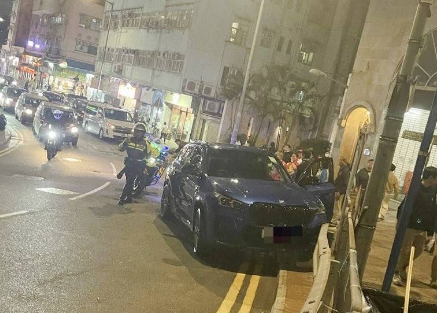 11-year-old child steers car for nearly 100 meters after father goes unconscious at wheel in Kennedy Town, Hong Kong