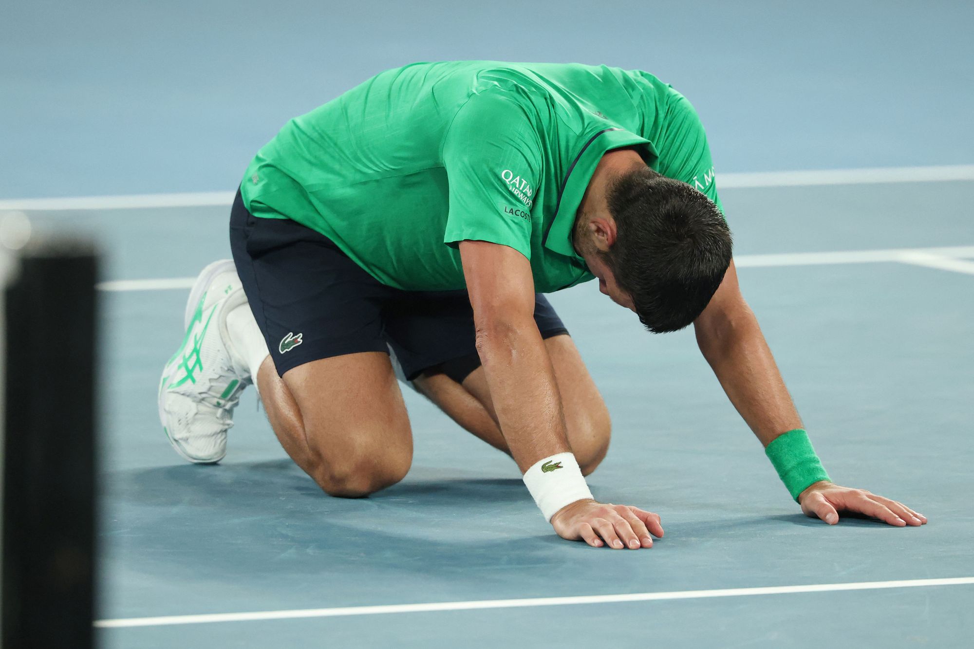 Djokovic fell to his knees as he celebrated victory over Sinner