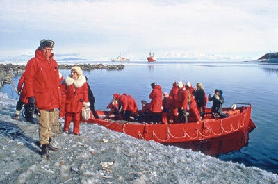 American Lars-Eric Lindblad pictured here with Antarctica's first tourists. The original mission was partly to inspire people to become stewards for the planet by exposing them to one of its most awe-inspiring areas