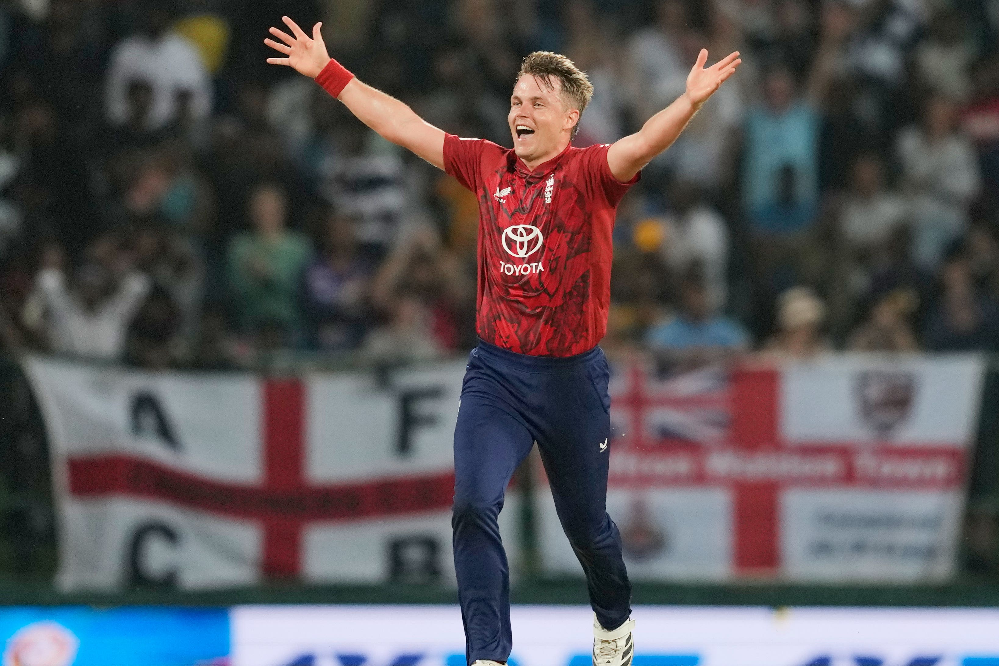 Sam Curran took England’s second ever T20 hat-trick (Eranga Jayawardena/AP)