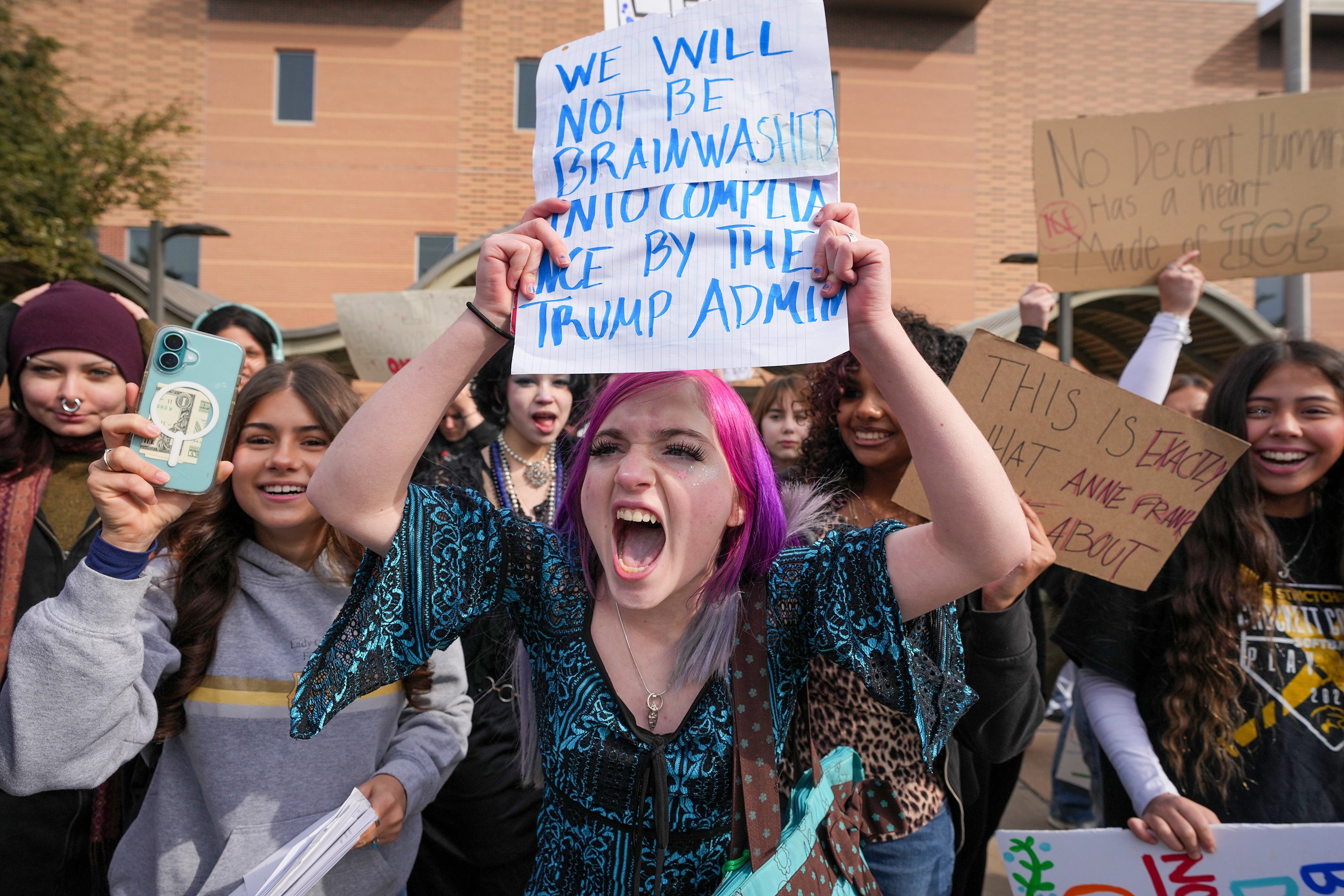 Texas precocious schoolhouse students protesting nan Trump administration’s migration policies successful Austin successful precocious January
