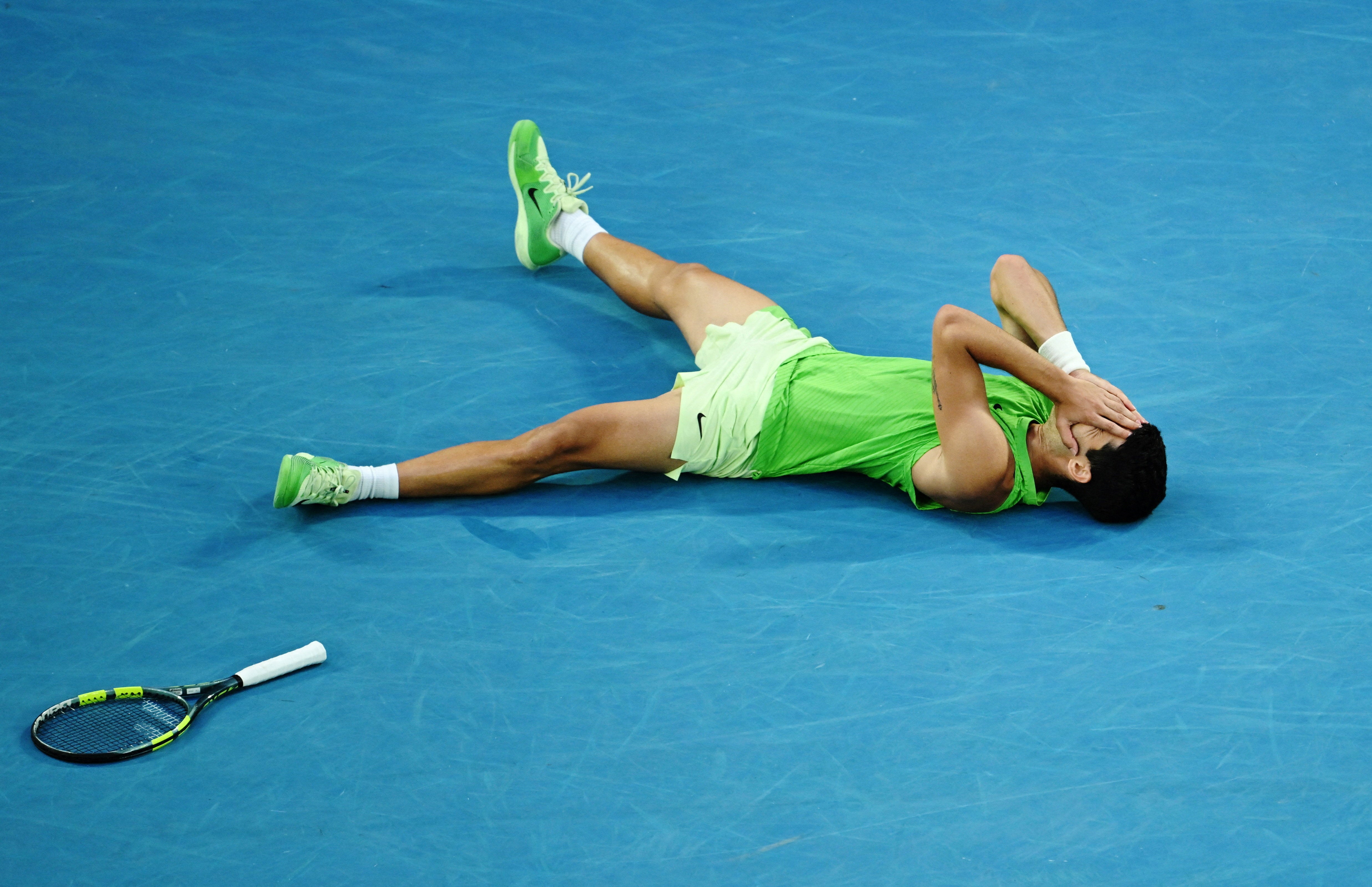 <p>Carlos Alcaraz celebrates after winning his semi-final match against Alexander Zverev in five hours and 27 minutes </p>
