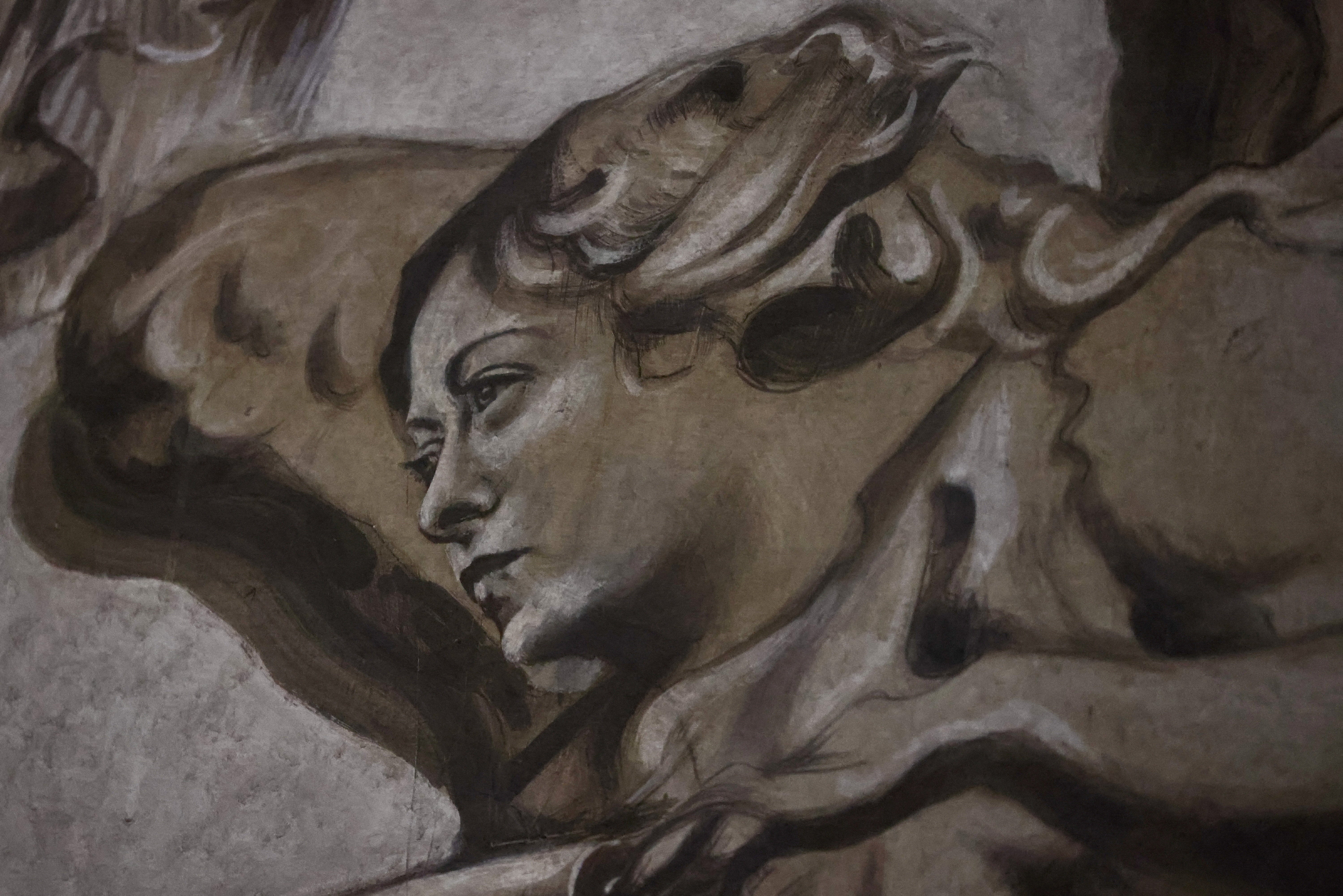 The restored angel fresco inside the Basilica of St. Lawrence in Lucina