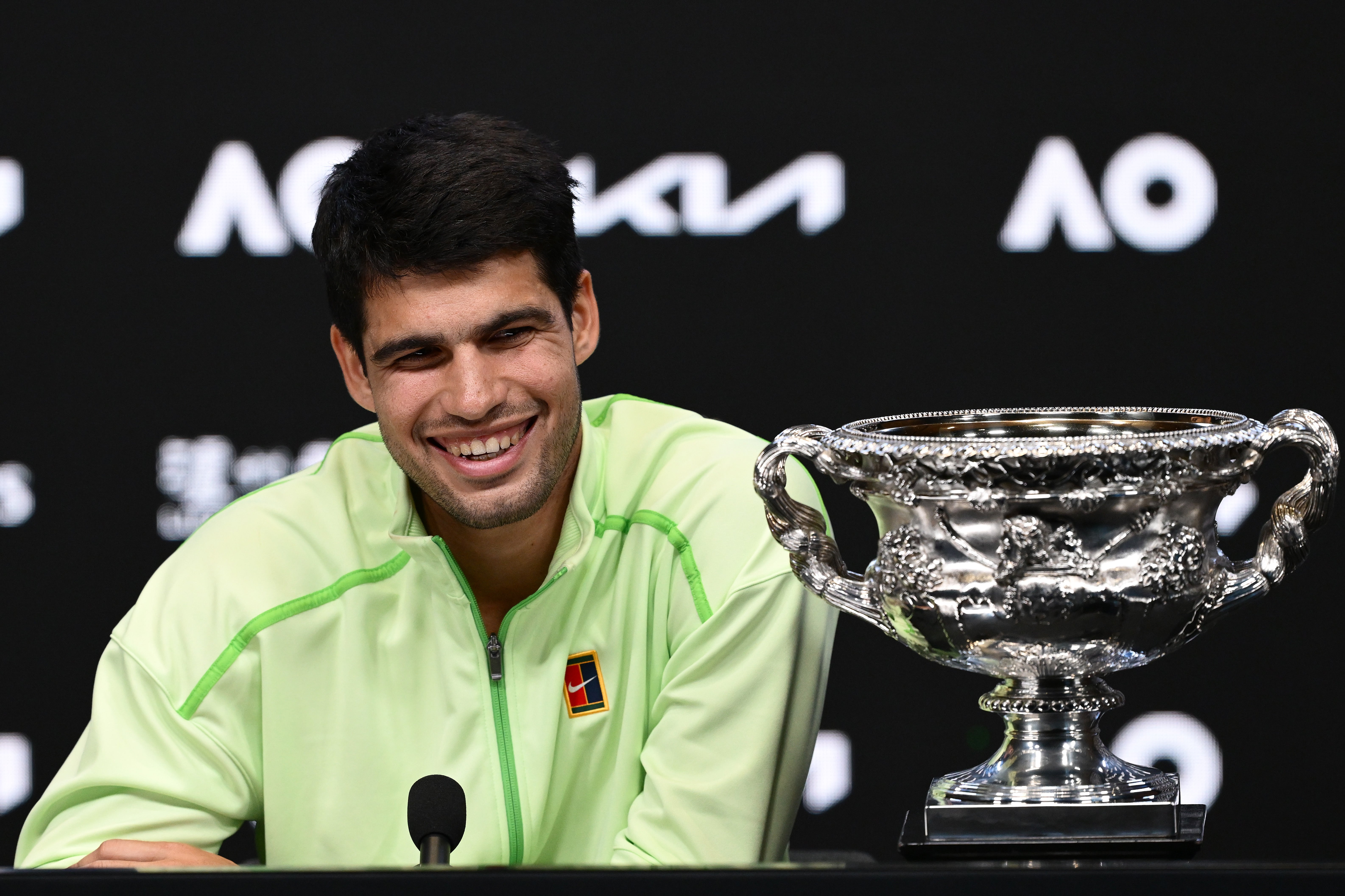 Carlos Alcaraz with his first Australian Open trophy