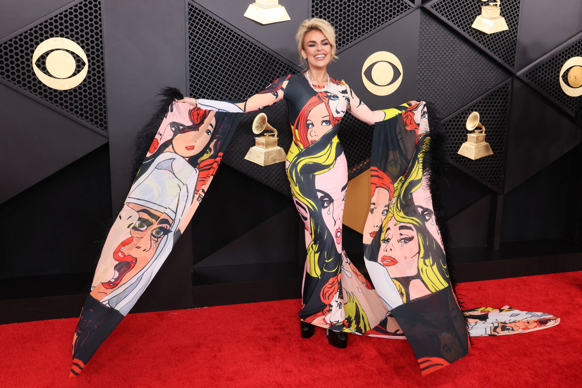 The Scottish singer walked the red carpet, appearing better suited for Comic-Con than the Grammys, with a gown covered in comic book panels