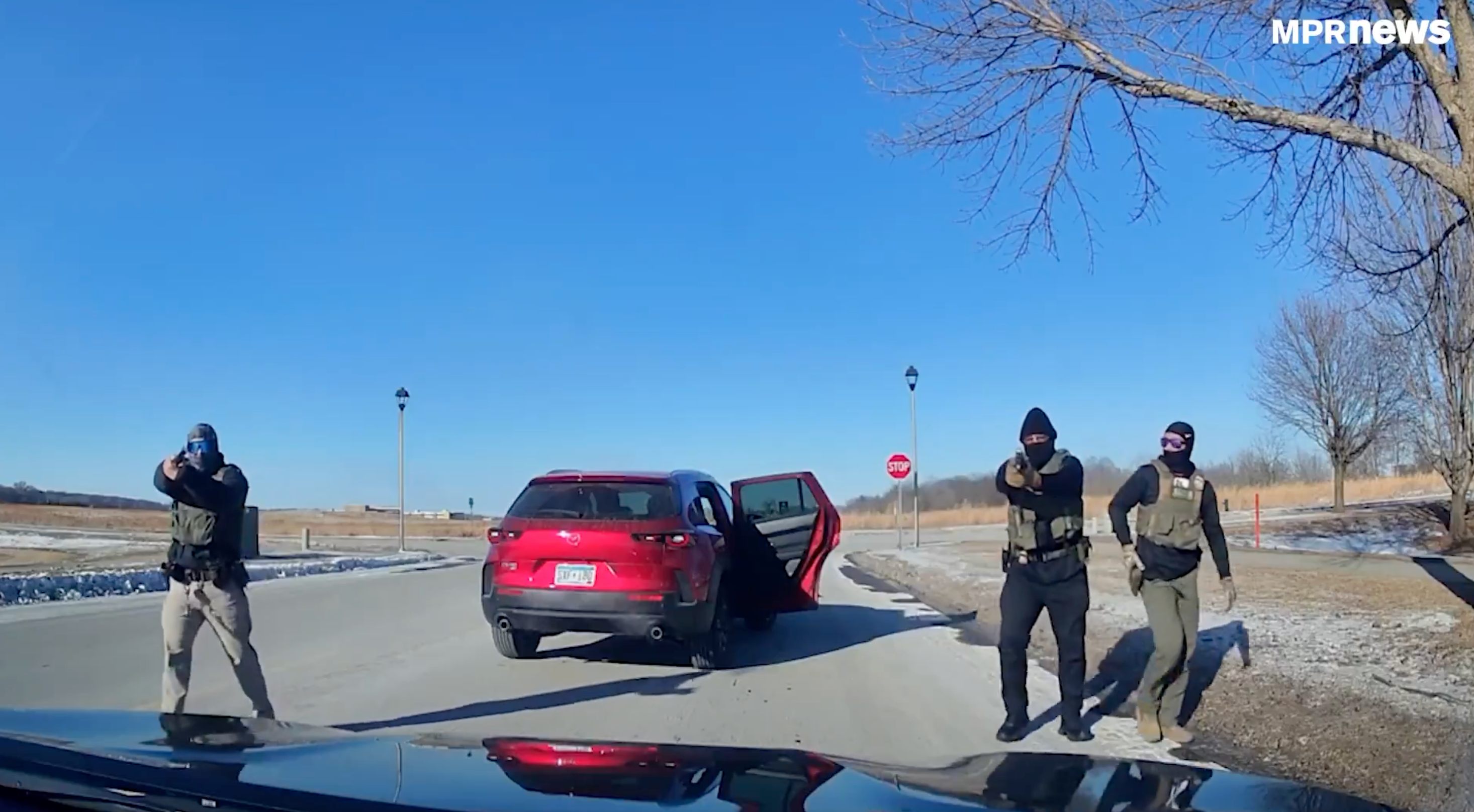 <p>A Minnesota driver was pulled over and detained at gunpoint by federal immigration agents, dashcam video shows. She said she was simply observing immigration enforcement activity, while ICE accused her of obstructing operations and ignoring commands</p>