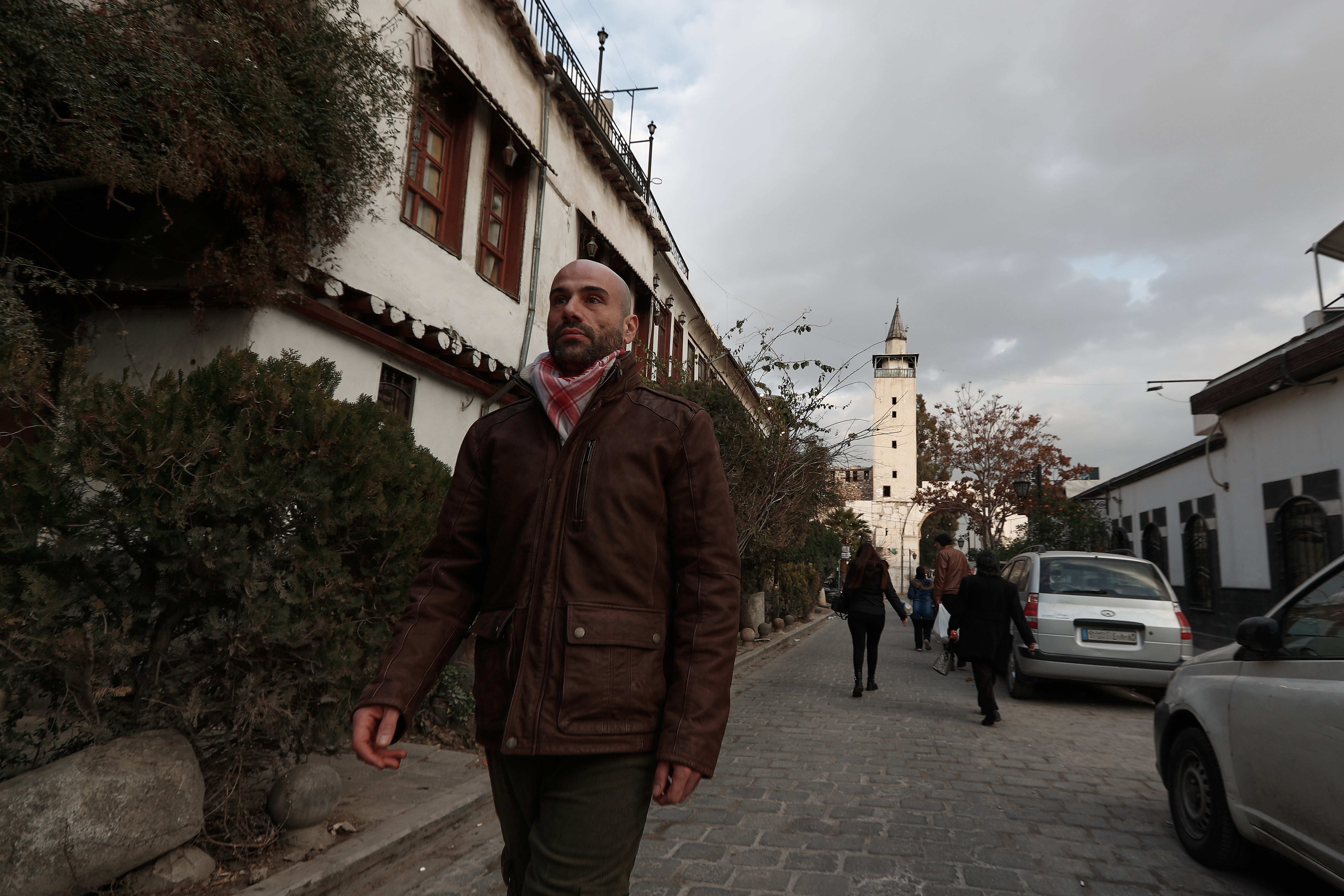 Hani Al Sawah walks on a street in old Damascus, Syria, Friday