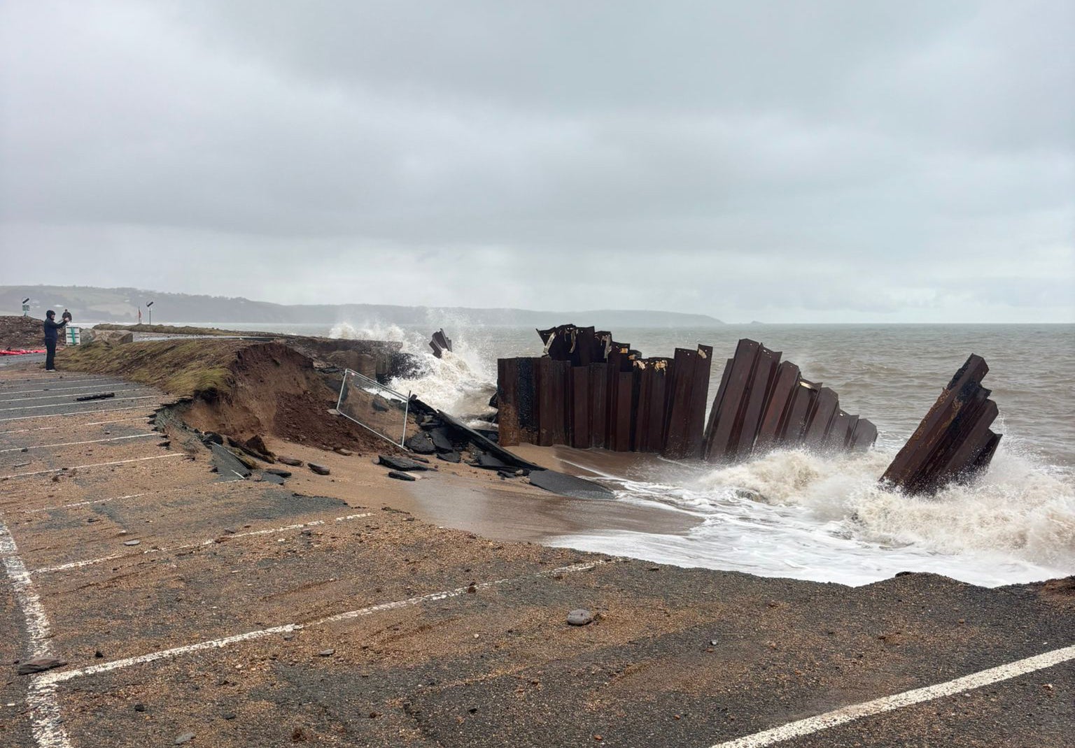 The road has collapsed into the sea