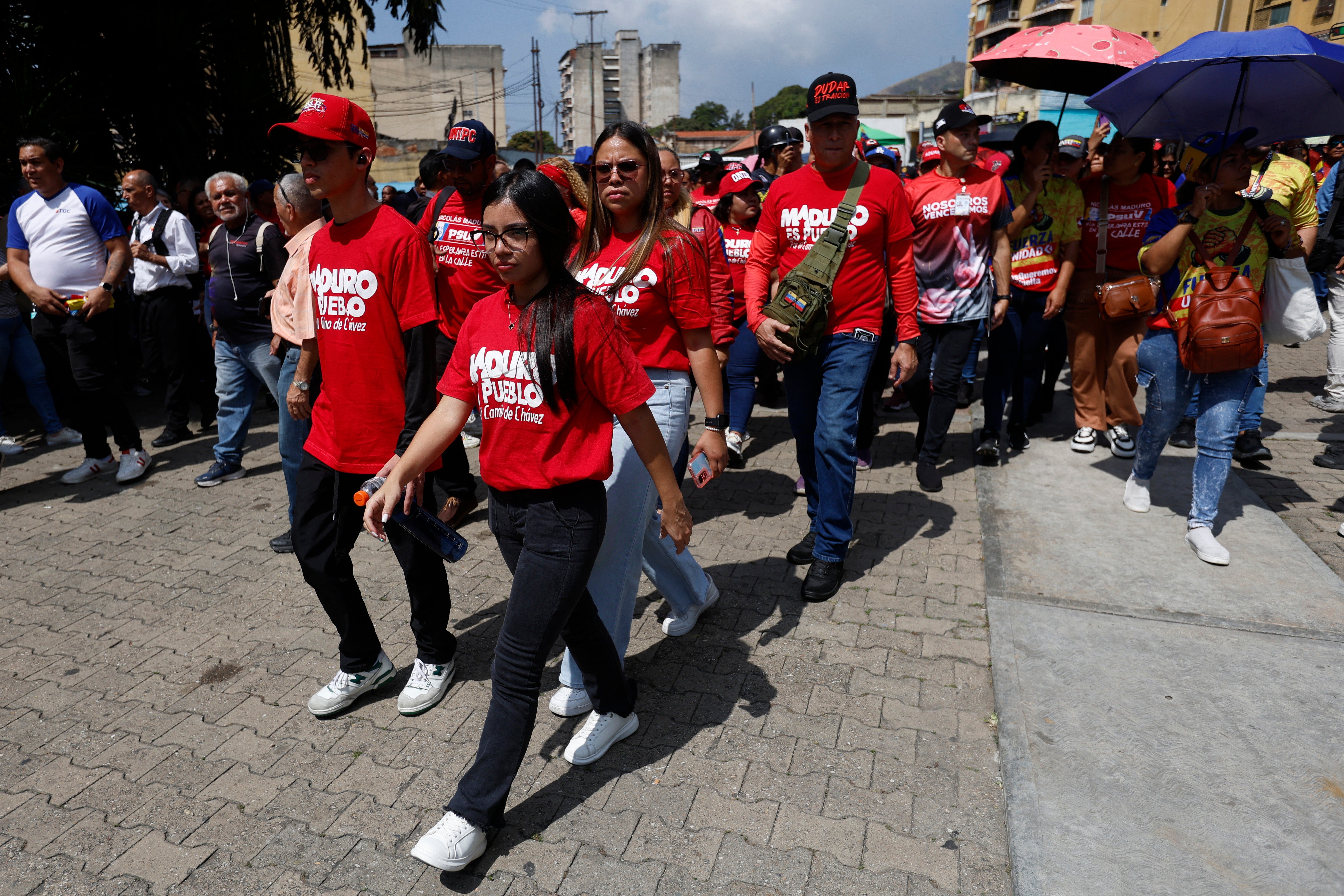 Government supporters take part in a march in Caracas organised by the United Socialist Party of Venezuela to demand the release of ousted president Nicolas Maduro