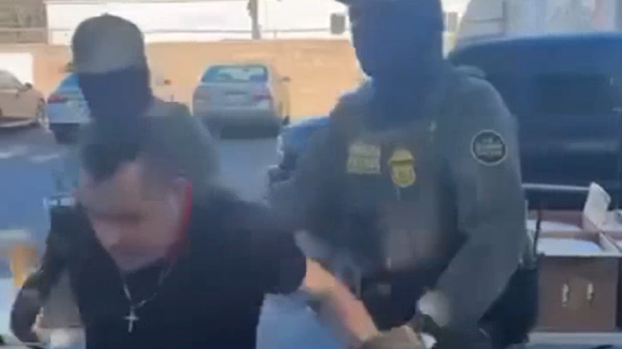 Video showed the agents escorting the man as onlookers tell them they’re not welcome on the church’s campus