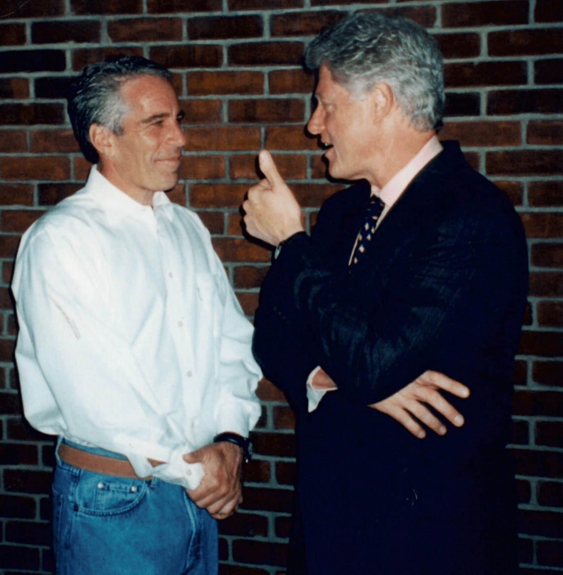 Jeffrey Epstein, left, and Bill Clinton in a photograph released from the Epstein files.