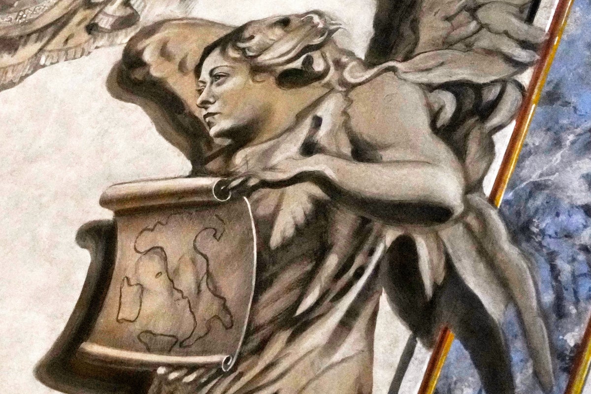 An angel resembling Italy's Meloni is painted over after an outcry from church and state