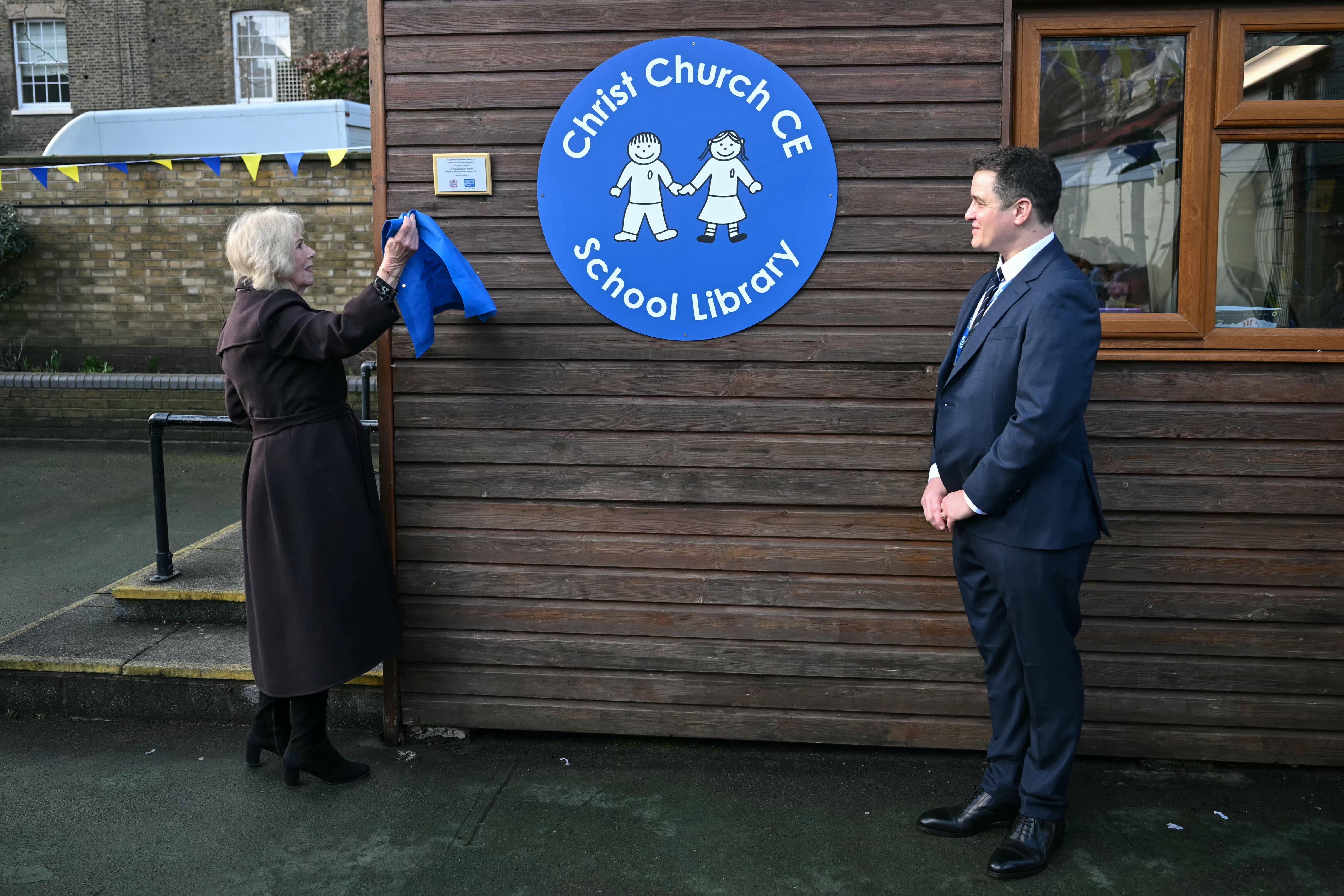 Queen Camilla unveiling a plaque for the new library (Justin Tallis/PA)