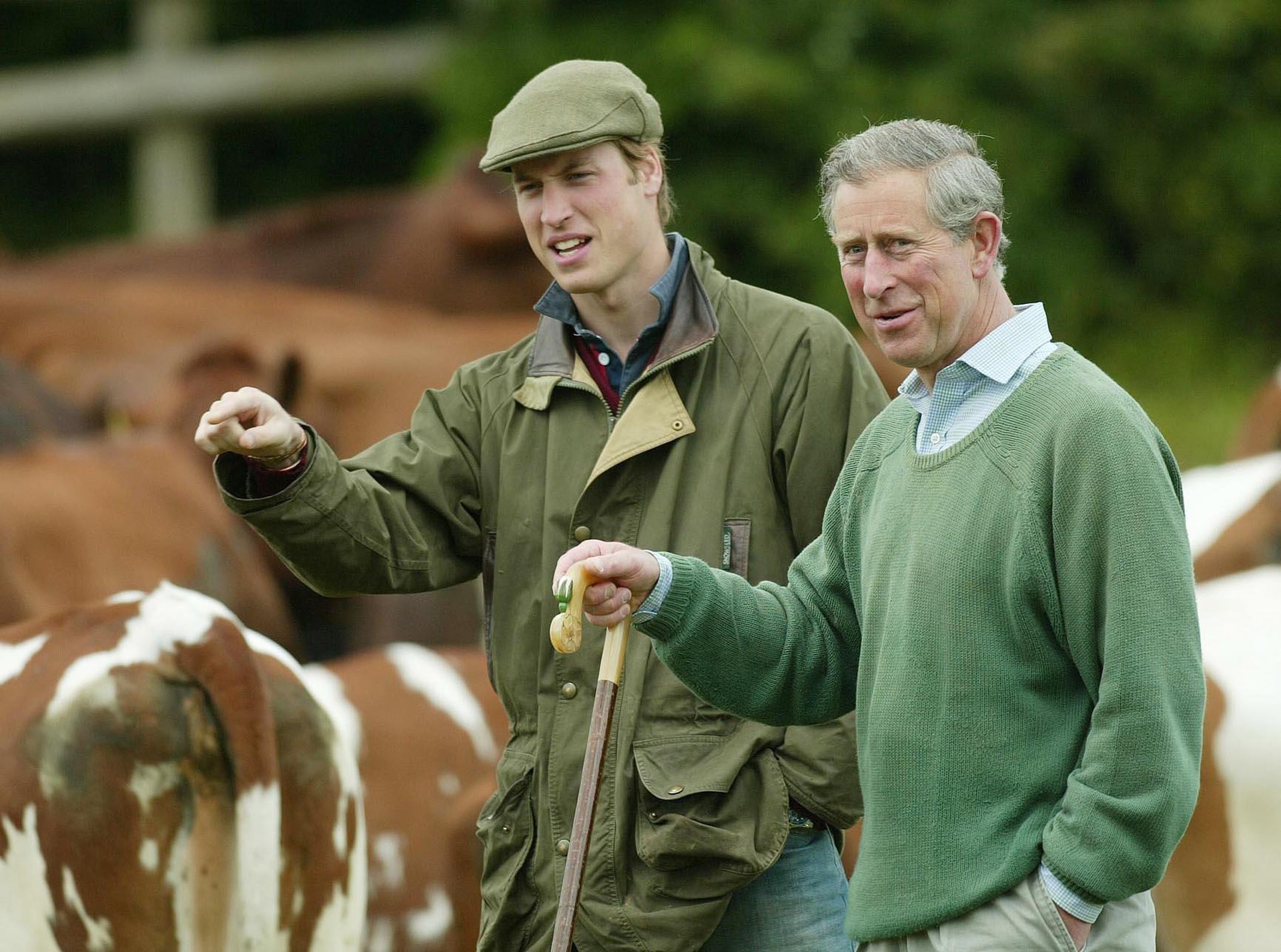 Prince William with his father, who was then the Prince of Wales, during a visit to Duchy Home Farm in Gloucestershire